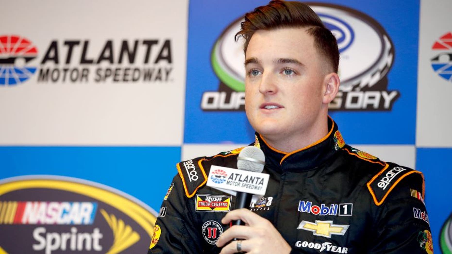 HAMPTON, GA - FEBRUARY 26: Ty Dillon, driver of the #14 Bass Pro Shops Tracker Boats Chevrolet, speaks with the media prior to practice for the NASCAR Sprint Cup Series Folds of Honor QuikTrip 500 at Atlanta Motor Speedway on February 26, 2016 in Hampton, Georgia. (Photo by Todd Warshaw/NASCAR via Getty Images)