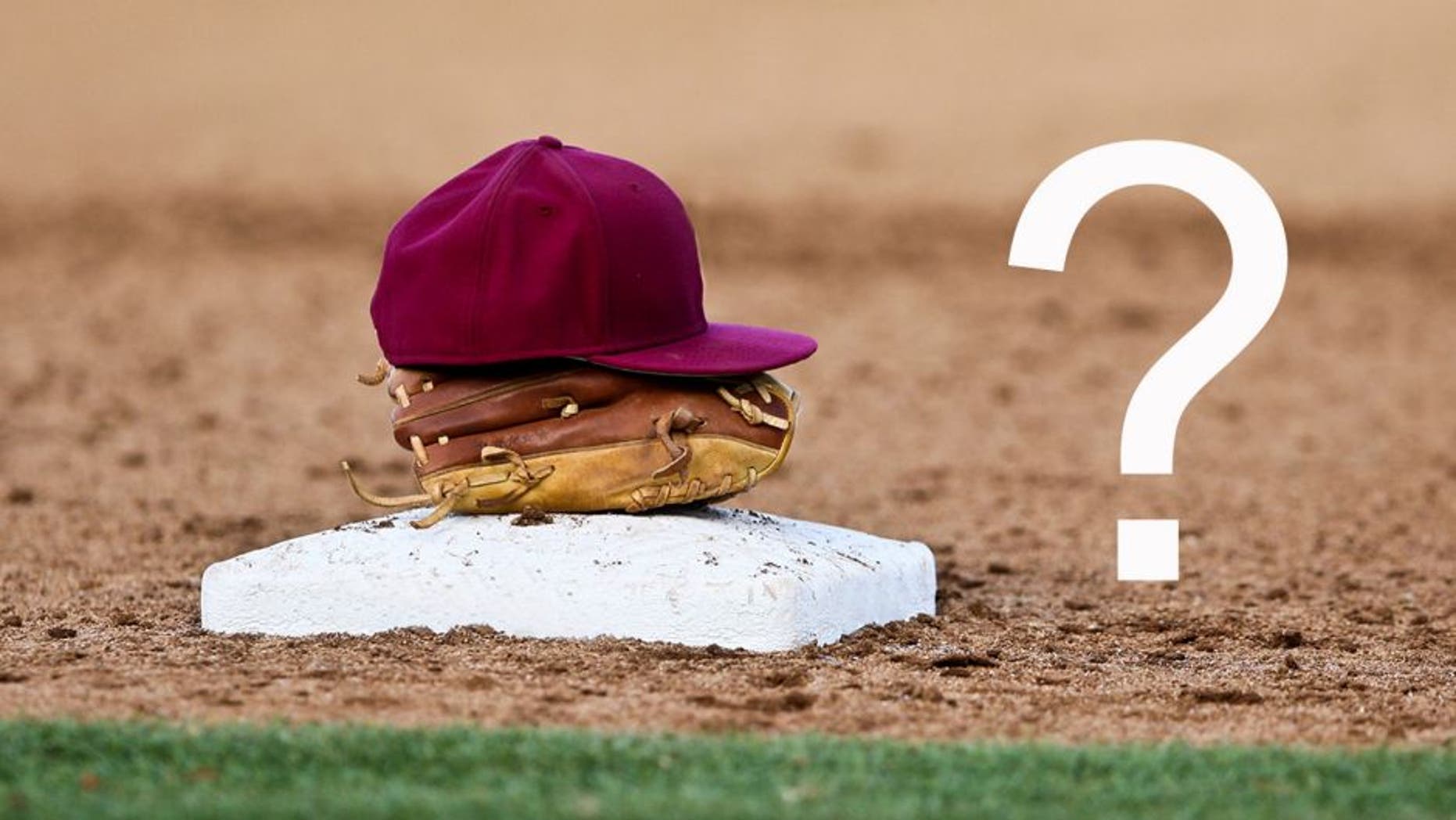 Jun 1, 2013; Tallahassee, FL, USA; A Florida State hat and glove sit on top of third base during the Tallahassee regional of the 2013 NCAA baseball tournament at Dick Howser Stadium. Mandatory Credit: Rob Foldy-USA TODAY Sports