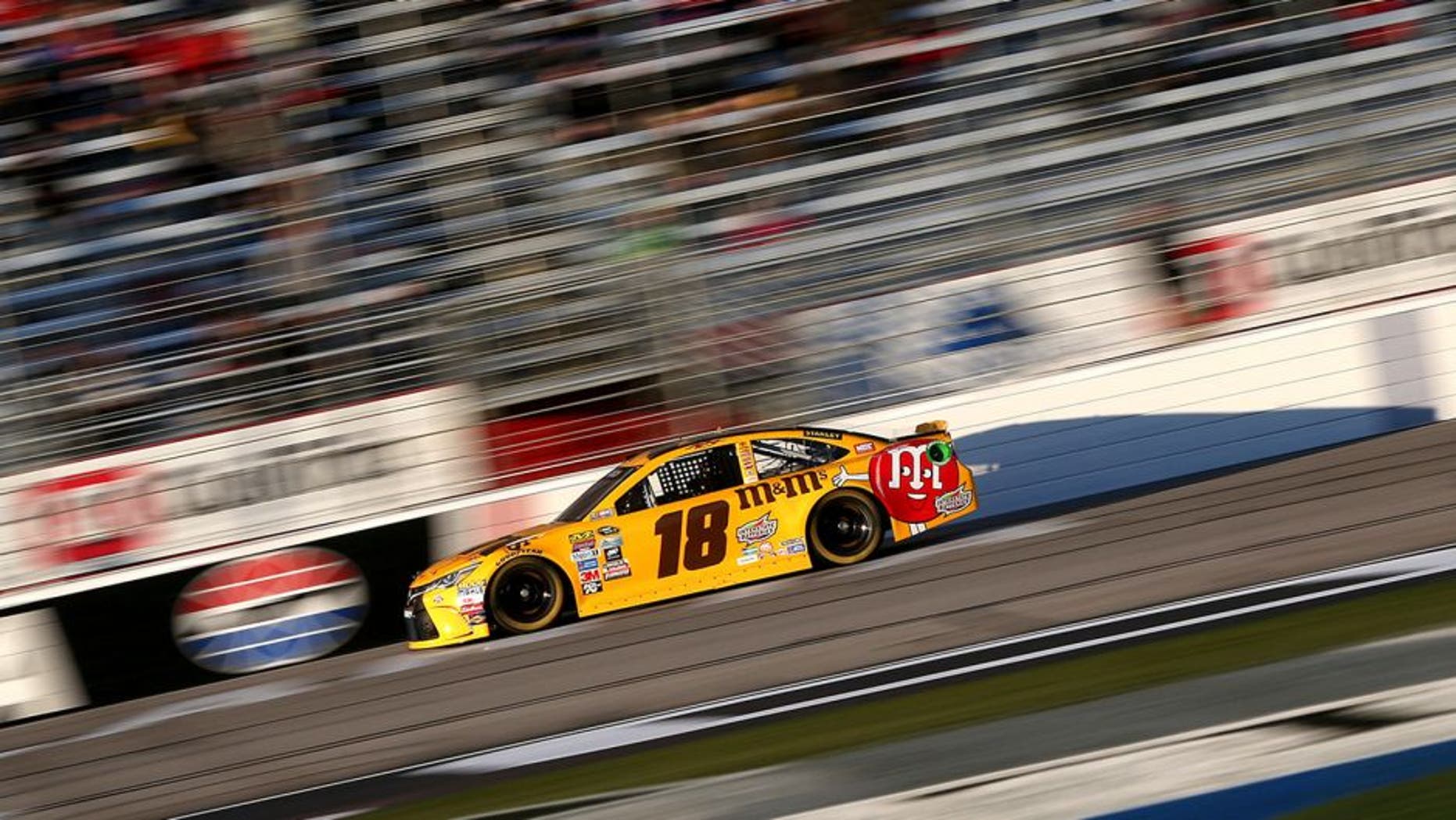HAMPTON, GA - FEBRUARY 26: Kyle Busch drives the #18 M&M's 75 Toyota during qualifying for the NASCAR Sprint Cup Series Folds of Honor QuikTrip 500 at Atlanta Motor Speedway on February 26, 2016 in Hampton, Georgia. (Photo by Matt Sullivan/NASCAR via Getty Images)