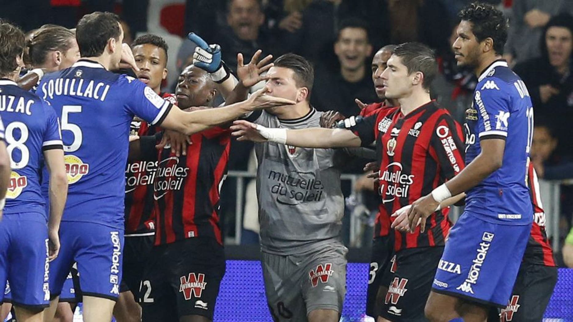 Players of both teams clash during the French L1 football match Nice (OGC Nice) vs Bastia (SCB) on February 26, 2016 at the "Allianz Riviera" stadium in Nice, southeastern France. AFP PHOTO / VALERY HACHE / AFP / VALERY HACHE (Photo credit should read VALERY HACHE/AFP/Getty Images)