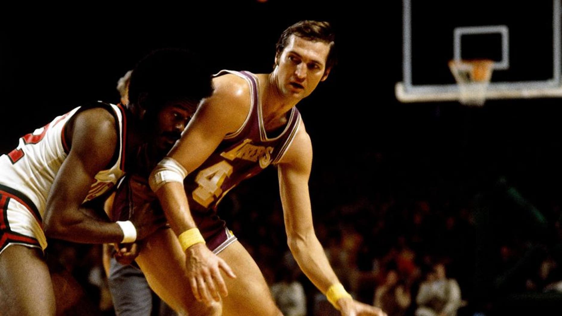 MILWAUKEE - 1970: Jerry West #44 of the Los Angeles Lakers moves the ball against the Milwaukee Bucks during the 1970 season at the MECCA Arena in Milwaukee, Wisconsin. NOTE TO USER: User expressly acknowledges that, by downloading and or using this photograph, User is consenting to the terms and conditions of the Getty Images License agreement. Mandatory Copyright Notice: Copyright 1970 NBAE (Photo by Vernon Biever/NBAE via Getty Images)