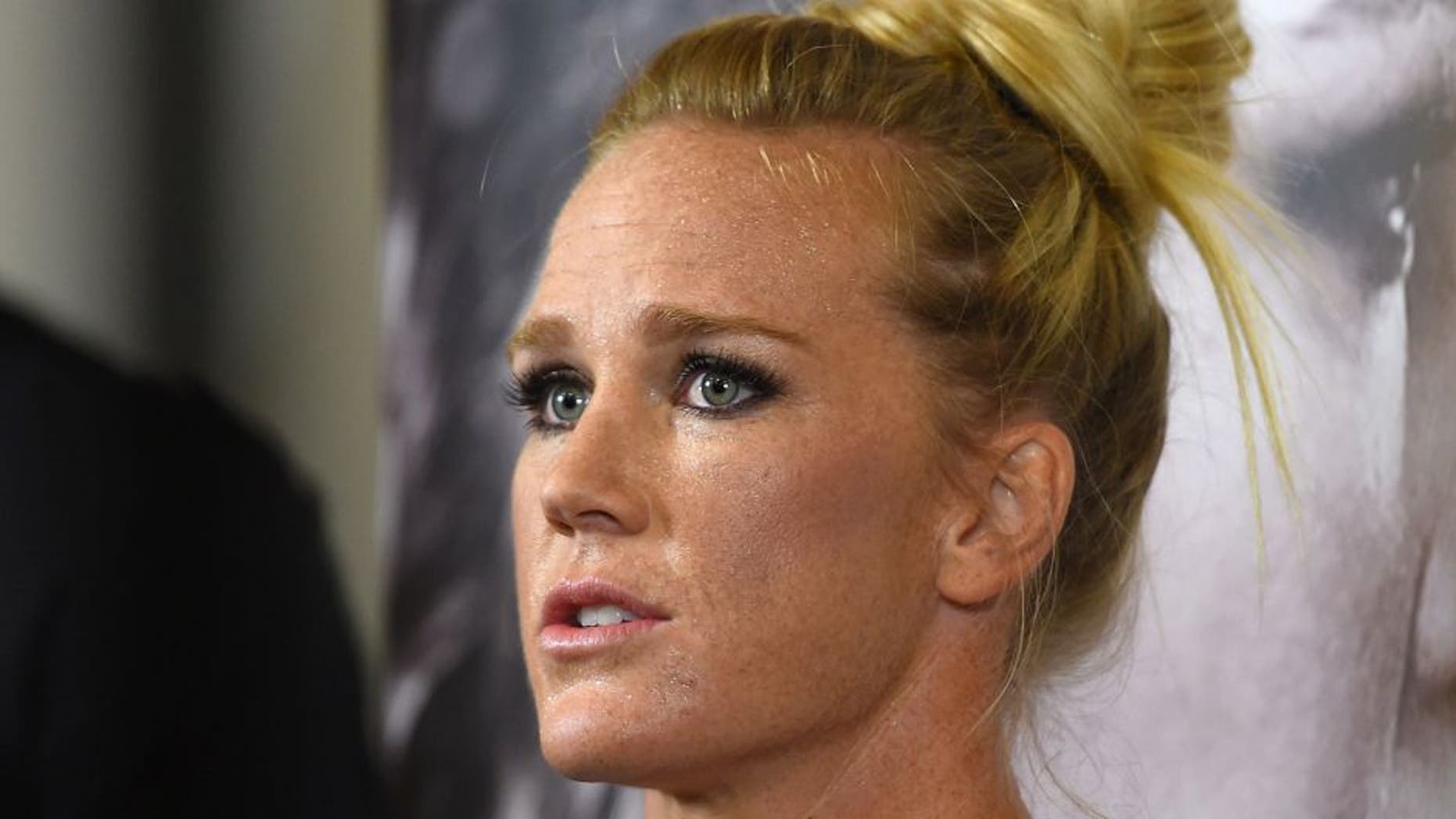 TORRANCE, CA - FEBRUARY 24: Holly Holm interacts with media after an open training session for fans and media at the UFC Gym on February 24, 2015 in Torrance, California. (Photo by Josh Hedges/Zuffa LLC/Zuffa LLC via Getty Images)