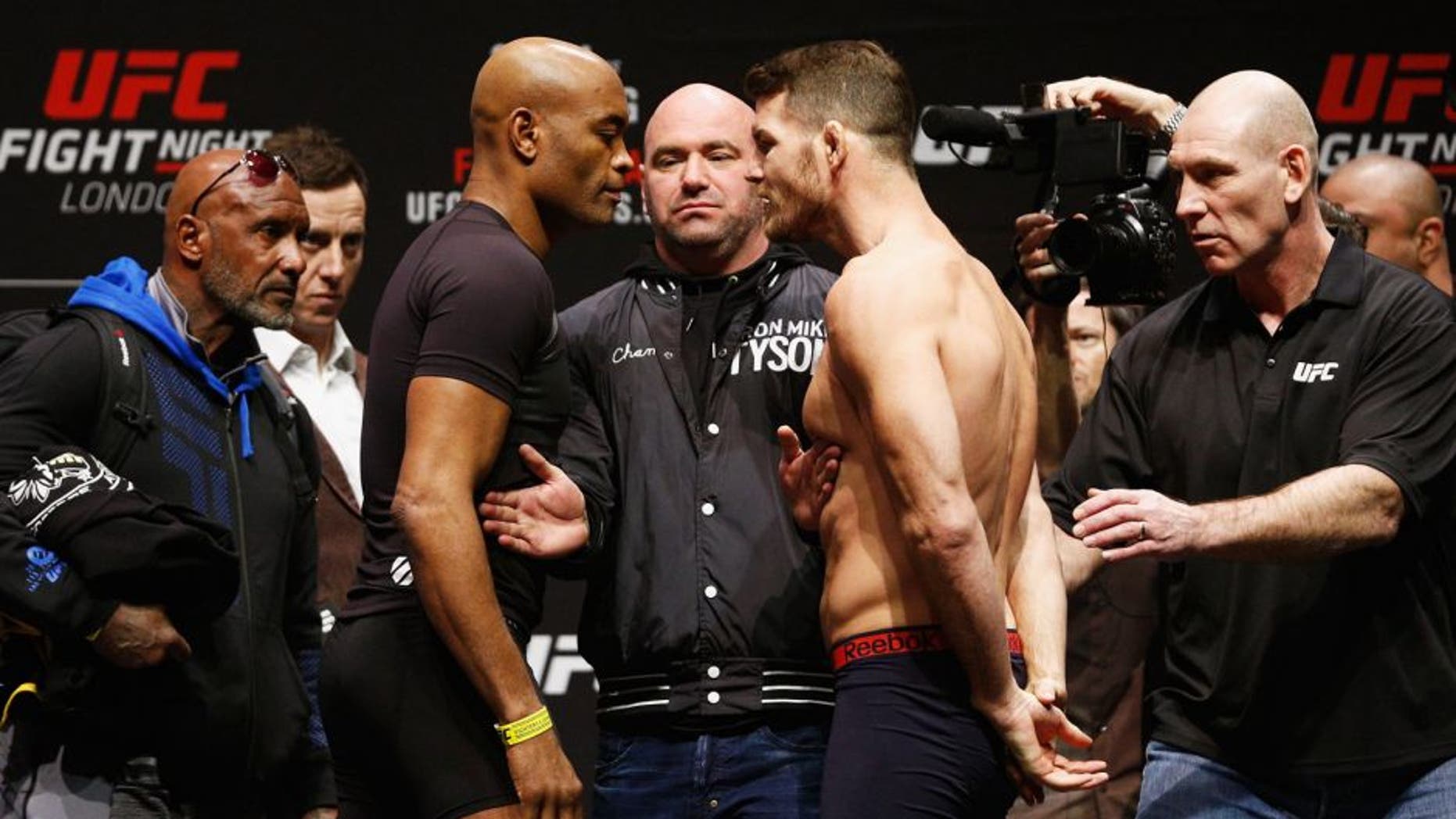 LONDON, ENGLAND - FEBRUARY 26: Anderson 'The Spider' Silva of Brazil and Michael 'The Count' Bisping of England come face to face and are held back by security during the UFC Fight Night Weigh-in held at at Indigo at The O2 Arena on February 26, 2016 in London, England. (Photo by Dean Mouhtaropoulos/Zuffa LLC/Zuffa LLC via Getty Images)