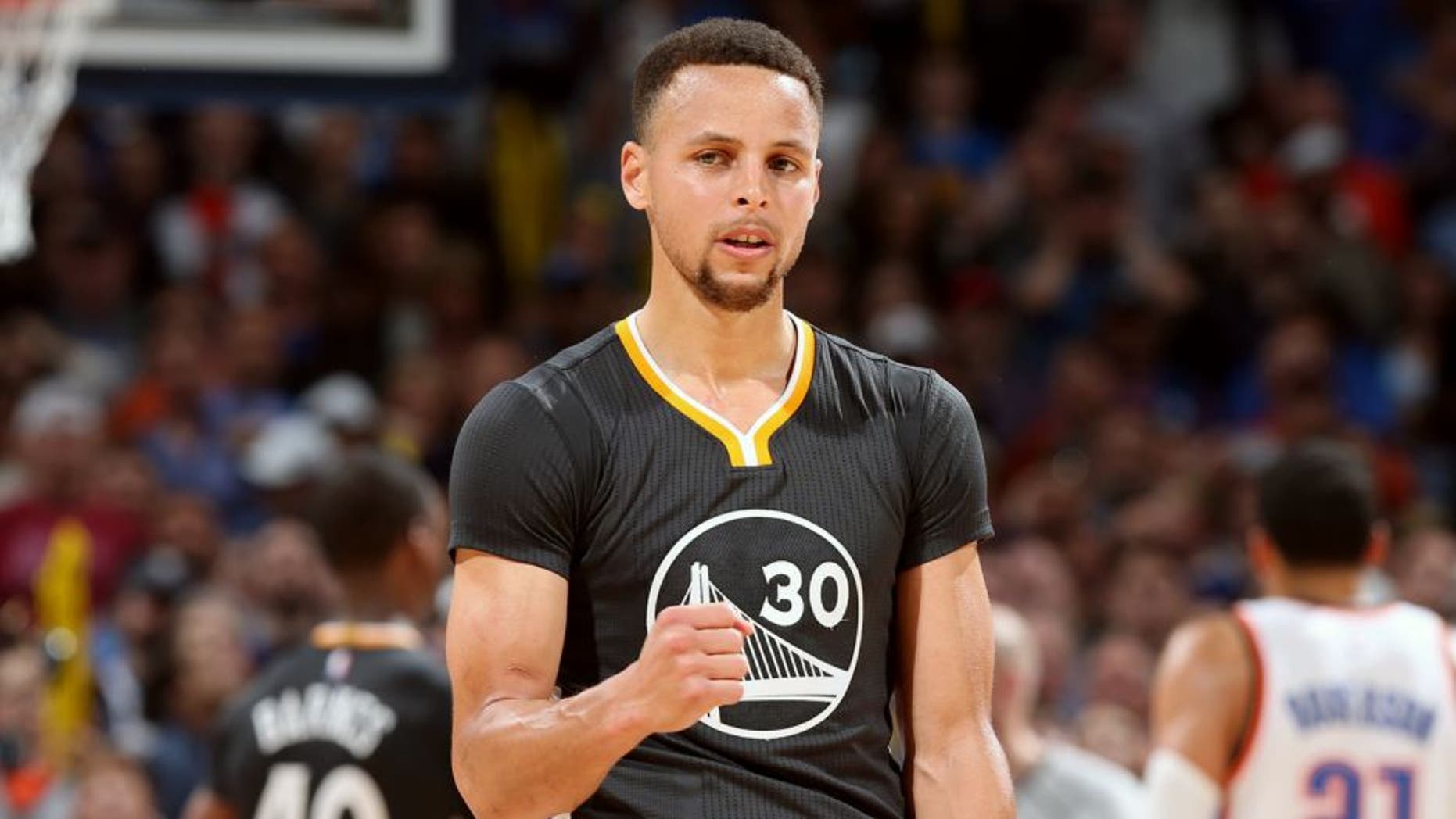 OKLAHOMA CITY, OK - FEBRUARY 27: Stephen Curry #30 of the Golden State Warriors celebrates after the game against the Oklahoma City Thunder on February 27, 2016 at Chesapeake Energy Arena in Oklahoma City, Oklahoma. NOTE TO USER: User expressly acknowledges and agrees that, by downloading and or using this photograph, User is consenting to the terms and conditions of the Getty Images License Agreement. Mandatory Copyright Notice: Copyright 2016 NBAE (Photo by Joe Murphy/NBAE via Getty Images)