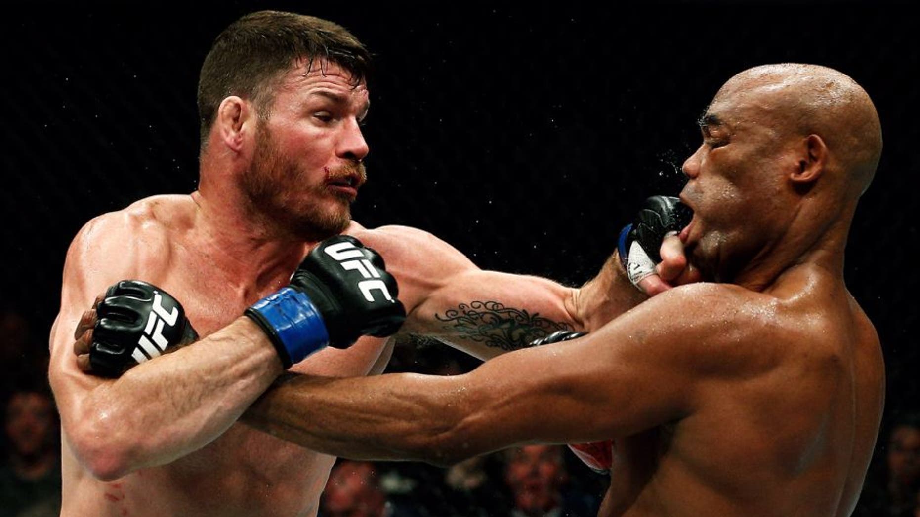 LONDON, ENGLAND - FEBRUARY 27: Anderson 'The Spider' Silva of Brazil (R) and Michael 'The Count' Bisping of England (L) compete in their Middleweight bout during the UFC Fight Night held at at Indigo at The O2 Arena on February 27, 2016 in London, England. (Photo by Dean Mouhtaropoulos/Zuffa LLC/Zuffa LLC via Getty Images)