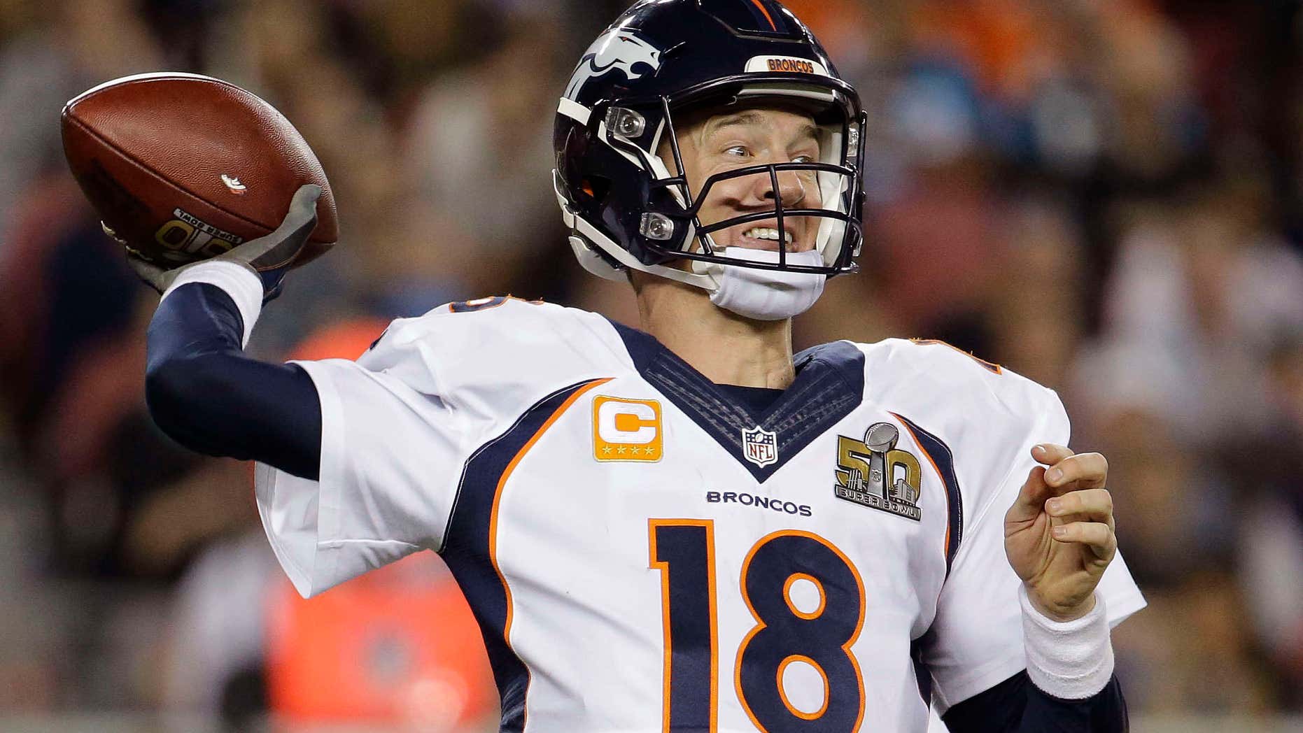 FILE - In this Sunday, Feb. 7, 2016 file photo, Denver Broncos’ Peyton Manning (18) passes against the Carolina Panthers during the second half of the NFL Super Bowl 50 football game in Santa Clara, Calif.