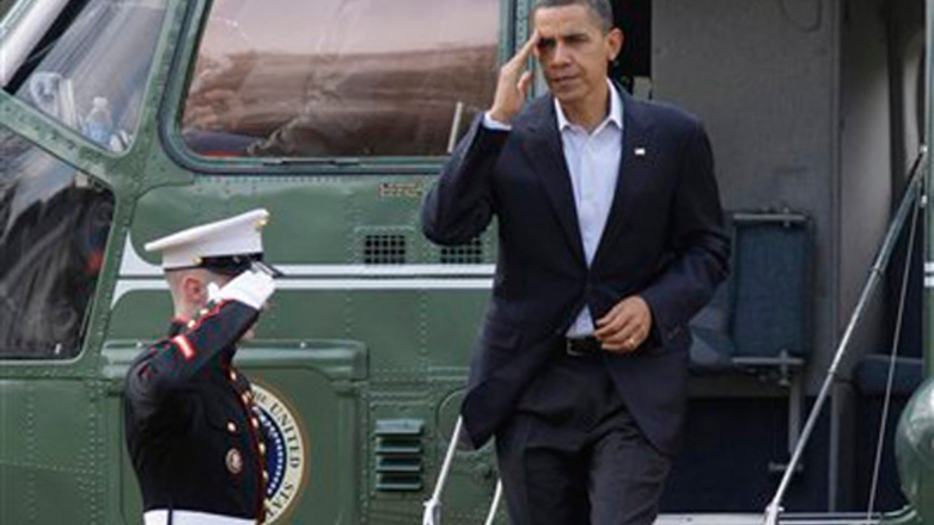 President Barack Obama returns to the White House from the National Naval Medical Center in Bethesda, Md., following a medical exam, Sunday, Feb. 28, 2010, in Washington. (AP)