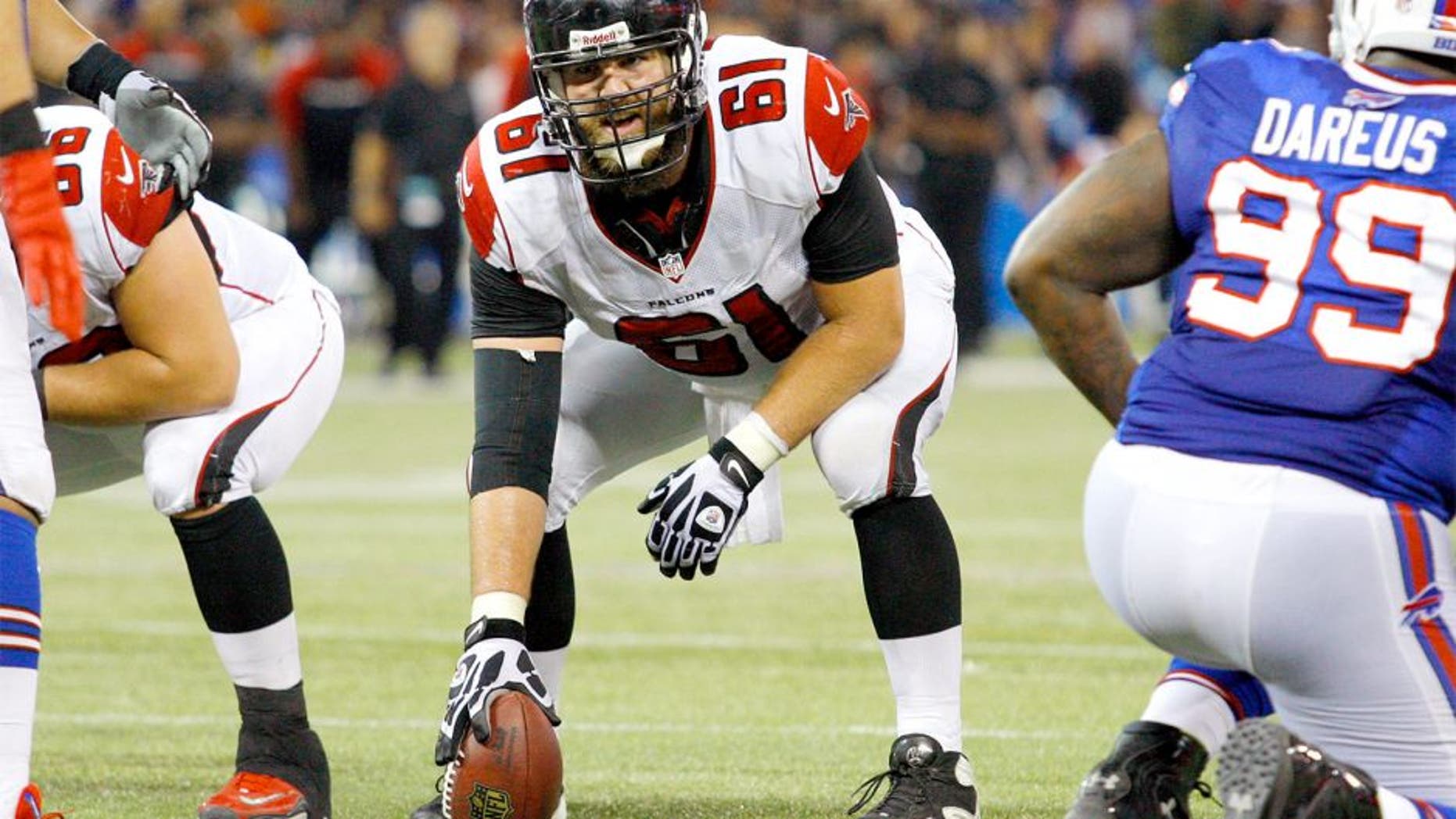 Dec 1, 2013; Toronto, ON, Canada; Atlanta Falcons center Joe Hawley (61) against the Buffalo Bills at the Rogers Center. Falcons beat the Bills 34 to 31 in overtime. Mandatory Credit: Timothy T. Ludwig-USA TODAY Sports