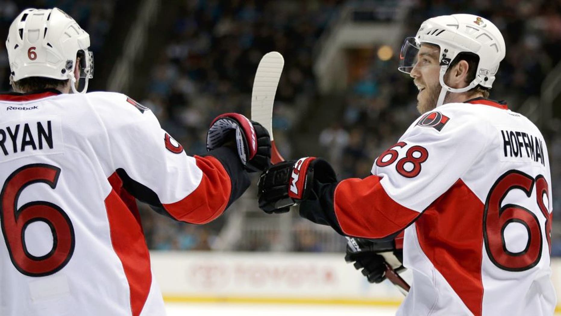 SAN JOSE, CA - FEBRUARY 28: Mike Hoffman #68 is congratulated by Bobby Ryan #6 of the Ottawa Senators after he scored a goal in the third period against the San Jose Sharks at SAP Center on February 28, 2015 in San Jose, California. (Photo by Ezra Shaw/Getty Images)
