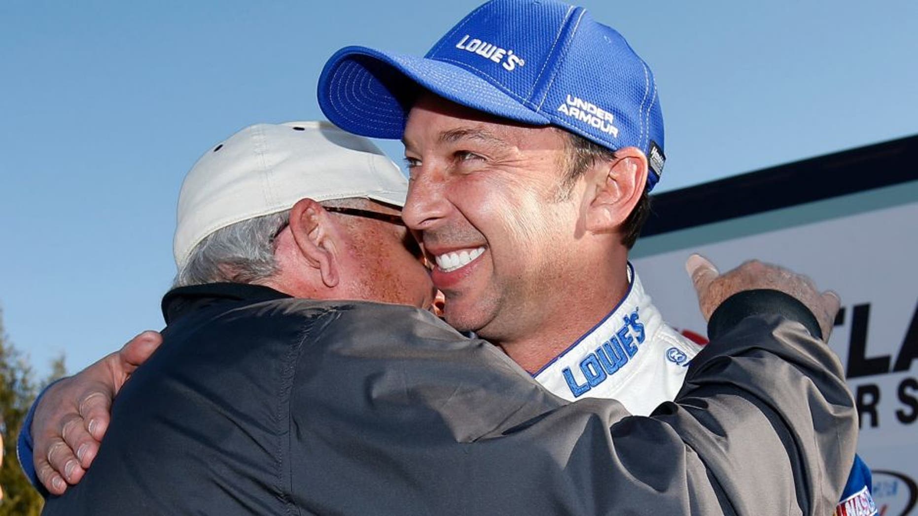 HAMPTON, GA - FEBRUARY 28: Chad Knaus, crew chief of Jimmie Johnson, driver of the #48 Lowe's Chevrolet, celebrates with team owner Rick Hendrick after winning the NASCAR Sprint Cup Series Folds of Honor QuikTrip 500 at Atlanta Motor Speedway on February 28, 2016 in Hampton, Georgia. (Photo by Todd Warshaw/NASCAR via Getty Images)