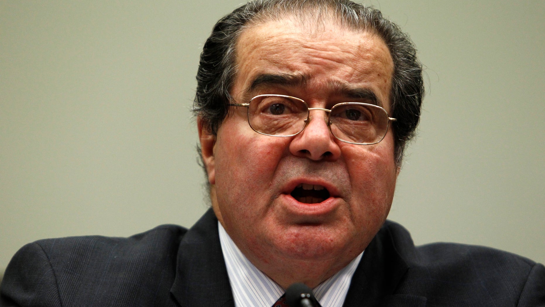 Supreme Court Justice Antonin Scalia testifies before a House Judiciary Commercial and Administrative Law Subcommittee on Capitol Hill in Washington May 20, 2010.<br>