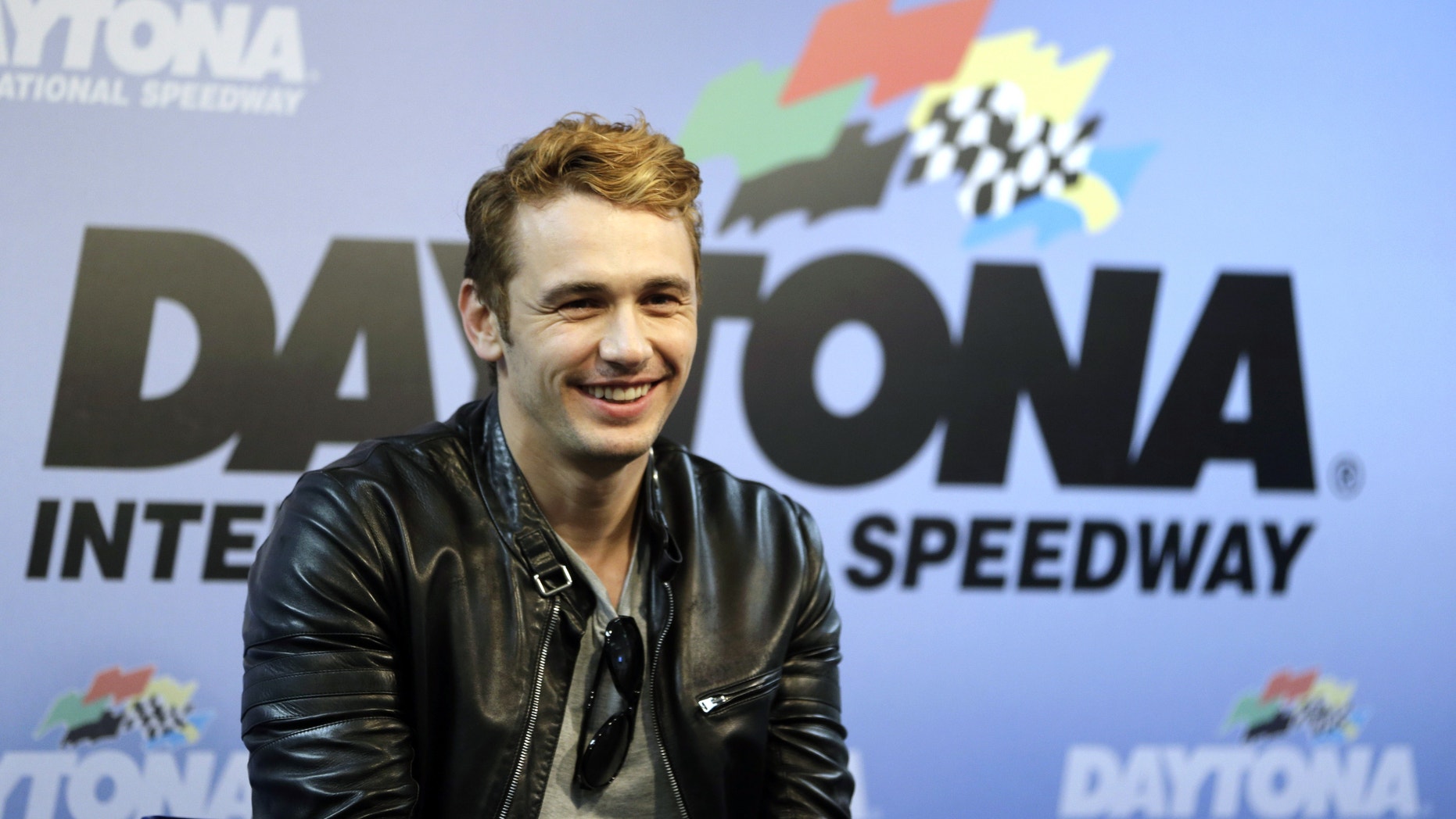 Actor James Franco, Honorary Grand Marshall for the NASCAR Daytona 500 Sprint Cup Series auto race answers questions during a news conference at Daytona International Speedway, Sunday, Feb. 24, 2013, in Daytona Beach, Fla.(AP Photo/John Raoux)