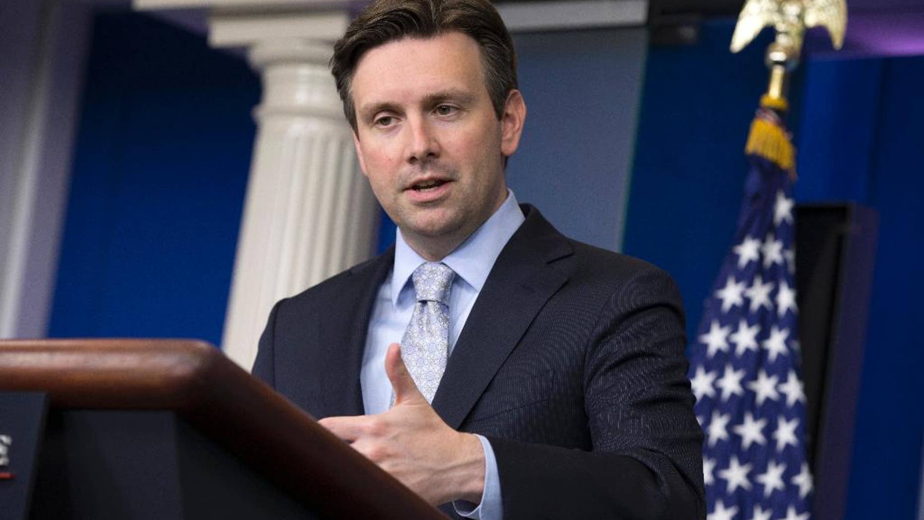 White House press secretary Josh Earnest answers a question on the battle against the Islamic State group in Iraq, Wednesday, June 10, 2015, during the daily press briefing at the White House in Washington (AP Photo/Evan Vucci)
