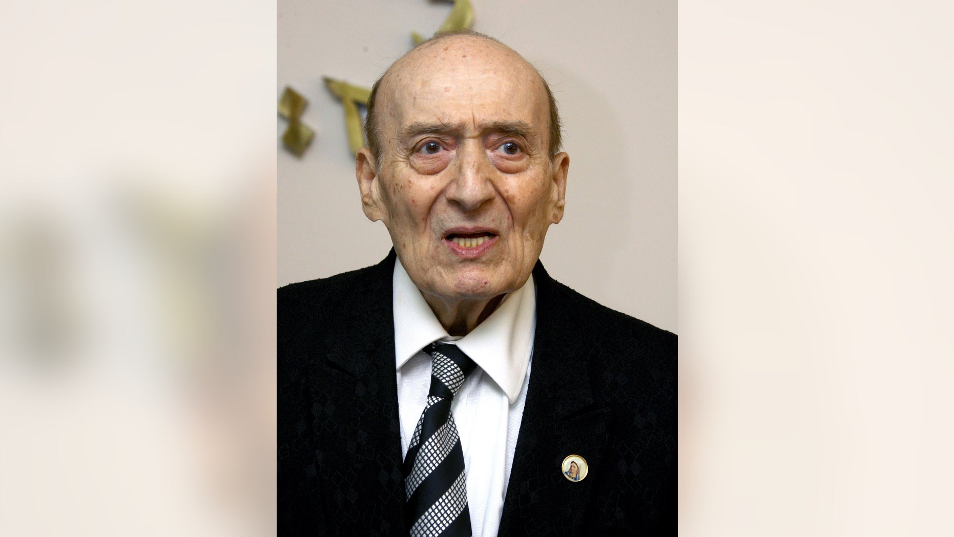 In this Wednesday, April 21, 2010 file photo, leading Lebanese singer and composer Wadih Safi speaks during a news conference to announce the Lebanon's Baalbek festival in Beirut, Lebanon. Safi passed away on Friday, Oct. 11, 2013 at the age of 92. (AP Photo/Ahmed Omar)