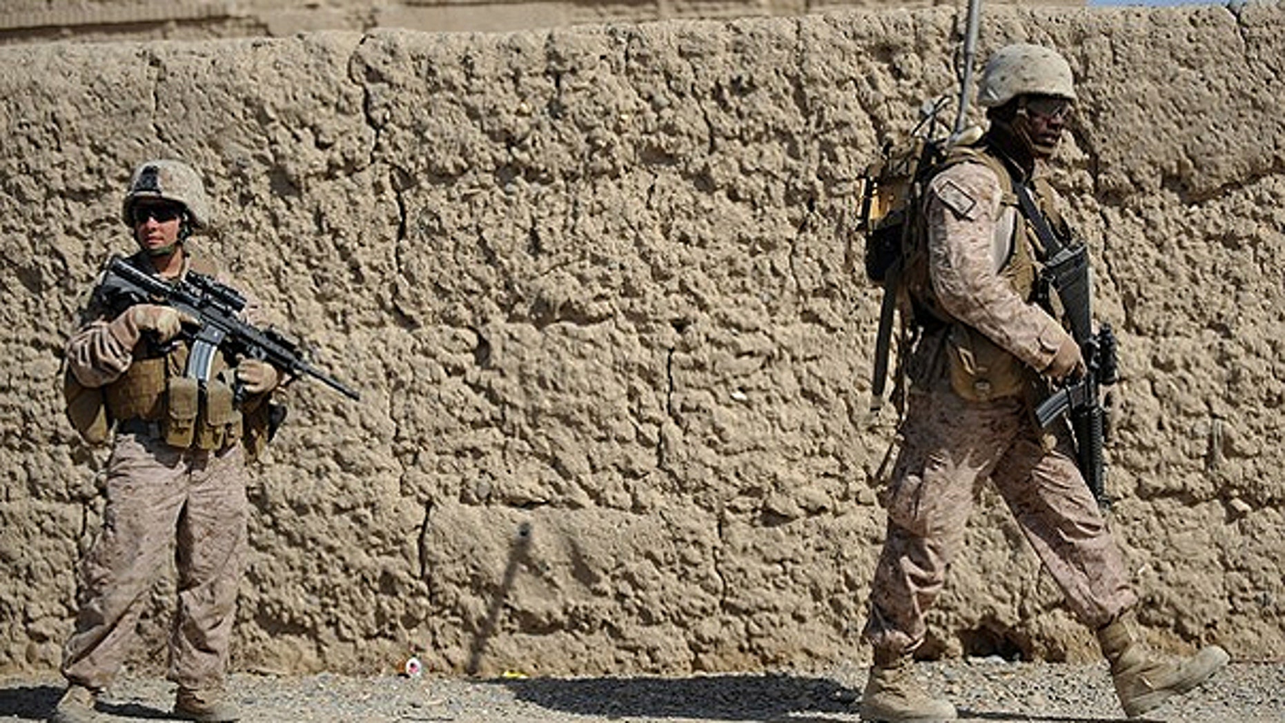 Feb. 23: Soldiers from the U.S. Marines 2nd Batallion, 1st Marines Regiment patrol in Garmser, Helmand province, Southern Afghanistan.