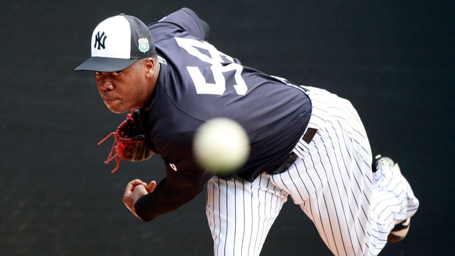 Feb 29, 2016; Tampa, FL, USA; New York Yankees relief pitcher Aroldis Chapman (54) pitches in live batting practice at George M. Steinbrenner Stadium. Mandatory Credit: Butch Dill-USA TODAY Sports