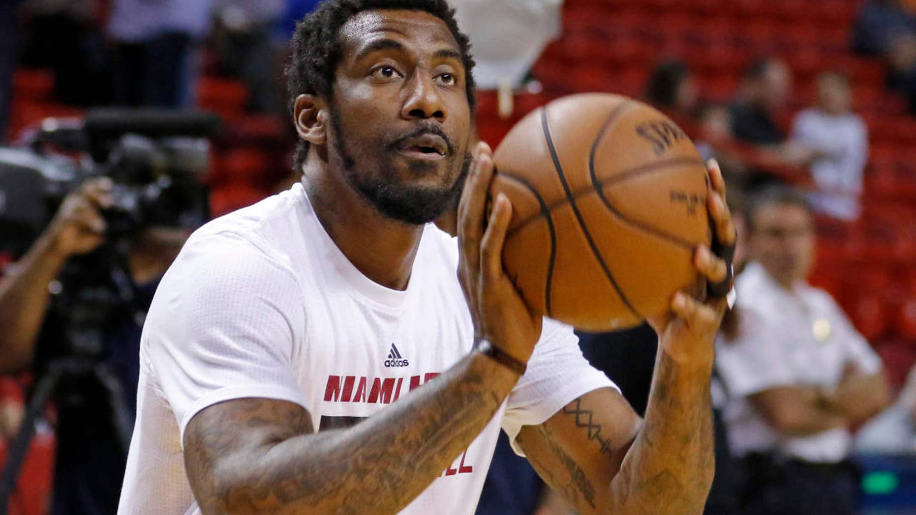 FILE - In this March 28, 2016, file photo, Miami Heat forward Amar'e Stoudemire shoots during warmups before the Heat met the Brooklyn Nets in an NBA basketball game, in Miami.