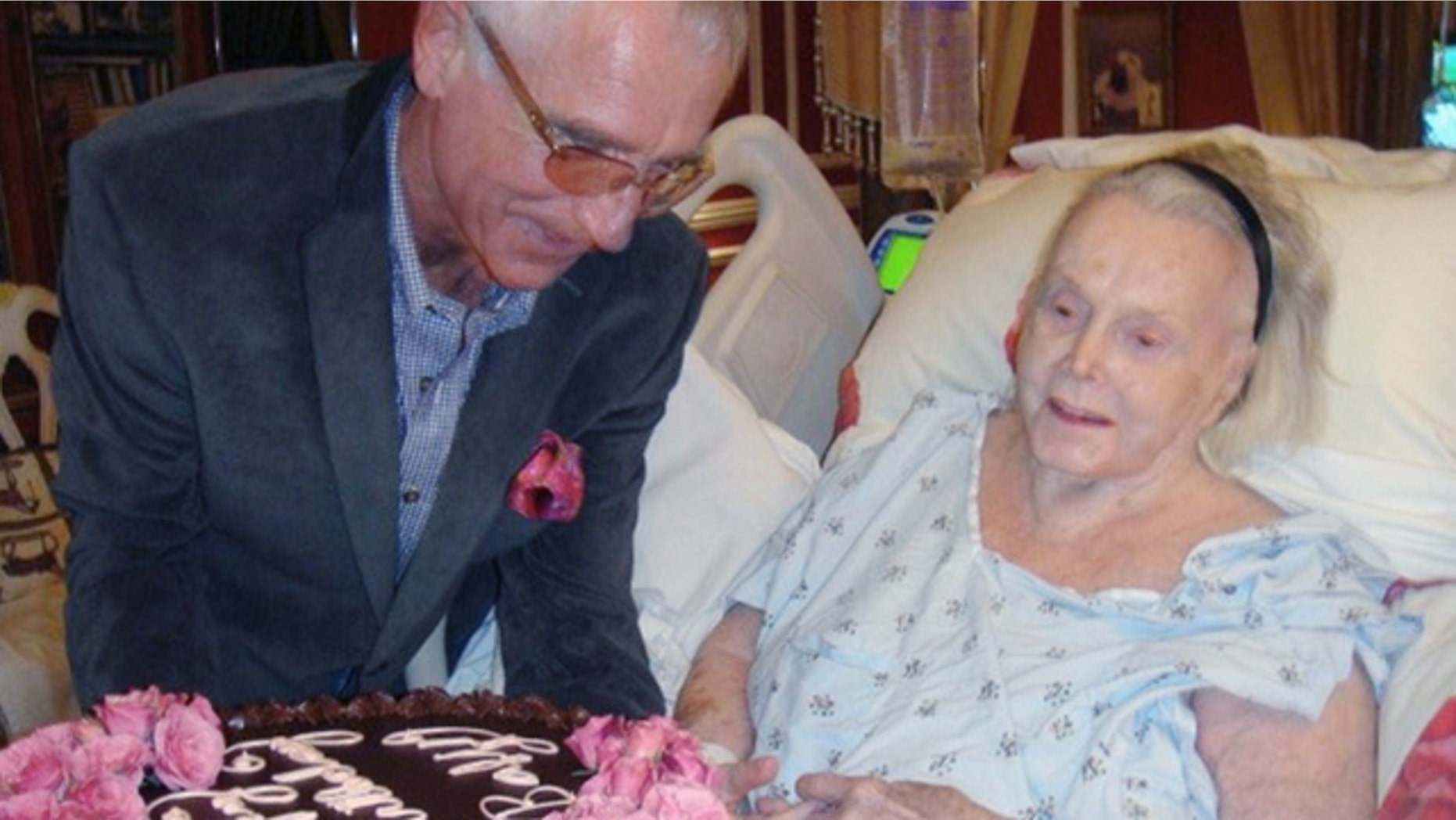 Feb. 6: In this photo provided by John Blanchette, Zsa Zsa Gabor, a sex symbol of the 1950s and 1960s, is seen in her Bel Air mansion in Los Angeles with her husband, Frederic Prinz von Anhalt, while celebrating her 94th birthday.