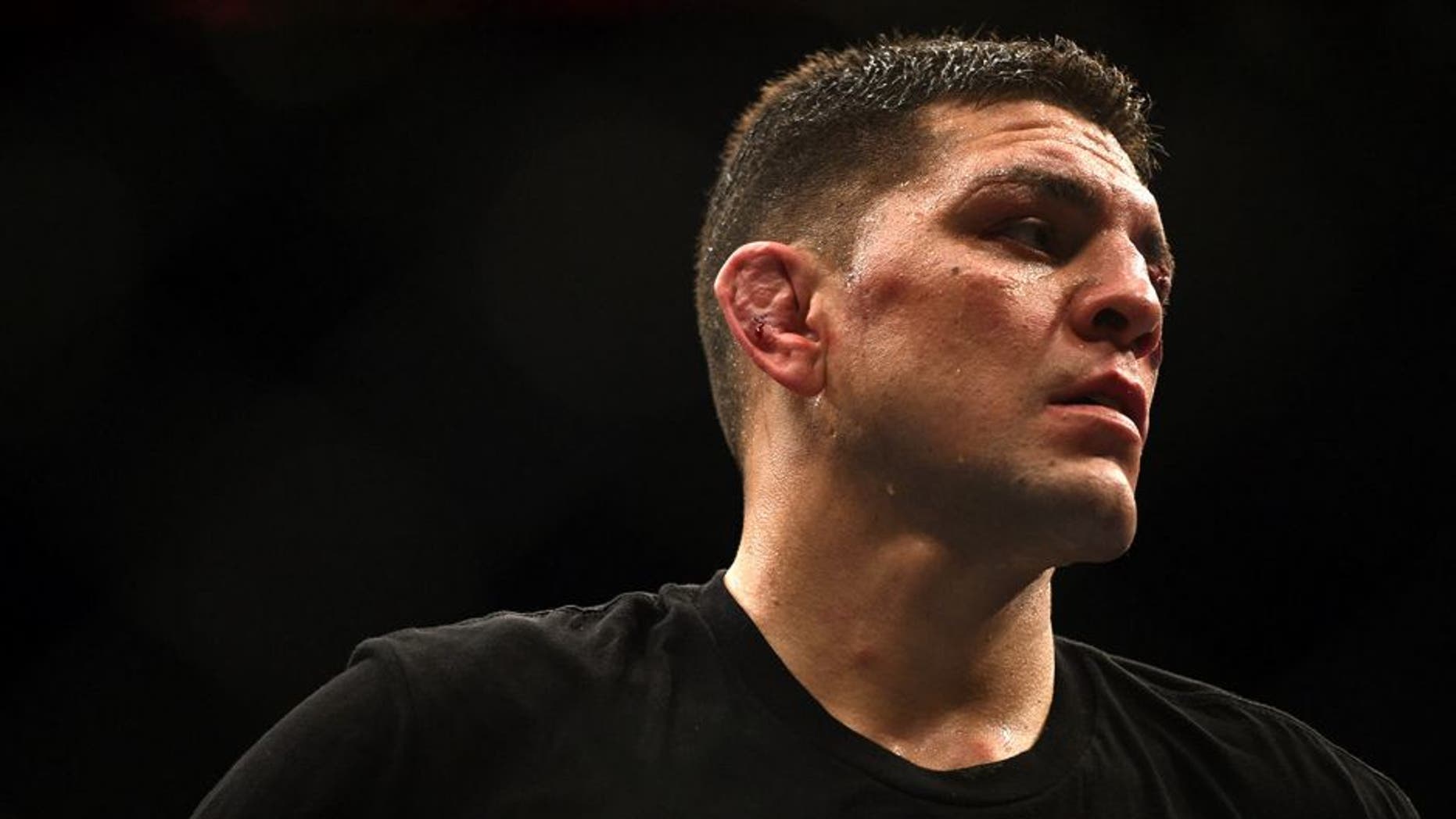 LAS VEGAS, NV - JANUARY 31: Nick Diaz stands in the Octagon after his middleweight bout during the UFC 183 event at the MGM Grand Garden Arena on January 31, 2015 in Las Vegas, Nevada. (Photo by Jeff Bottari/Zuffa LLC/Zuffa LLC via Getty Images)
