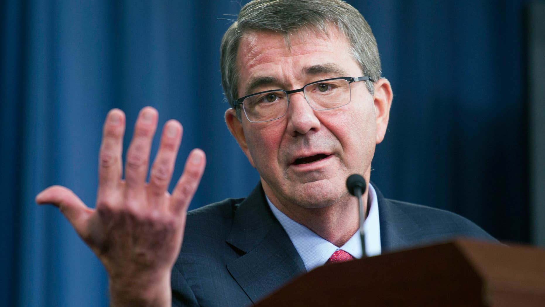 FILE - In this Jan. 28, 2016 file photo, Defense Secretary Ash Carter gestures during a news conference at the Pentagon.