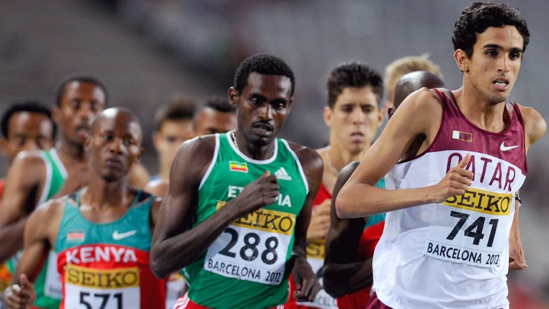 BARCELONA, SPAIN - JULY 12: Hamza Driouch of Qater leads the Men's 1500 metres Final on the day three of the 14th IAAF World Junior Championships at Estadi Olimpic Lluis Companys on July 12, 2012 in Barcelona, Spain. (Photo by David Ramos/Getty Images)
