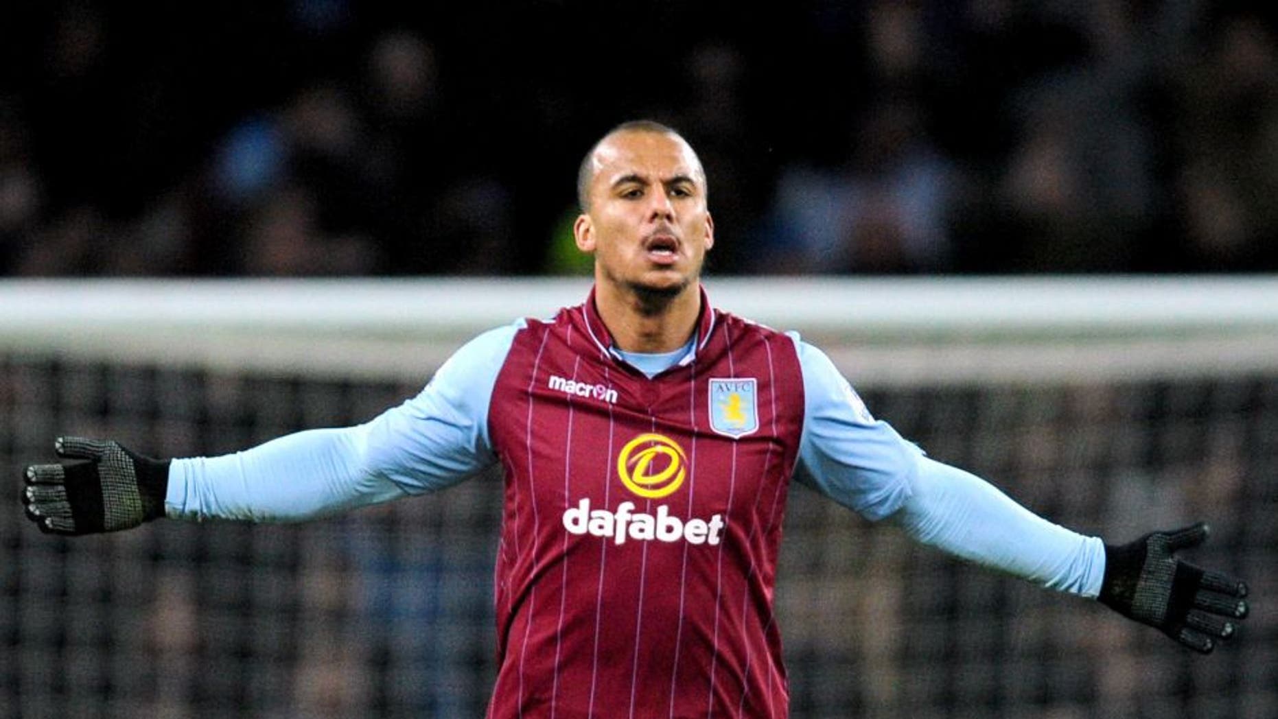 Aston Villa's Gabriel Agbonlahor celebrates after scoring against West Brom during the English Premier League soccer match between Aston Villa and West Bromwich Albion at Villa Park, in Birmingham, England, Tuesday, March 3, 2015. (AP Photo/Rui Vieira)