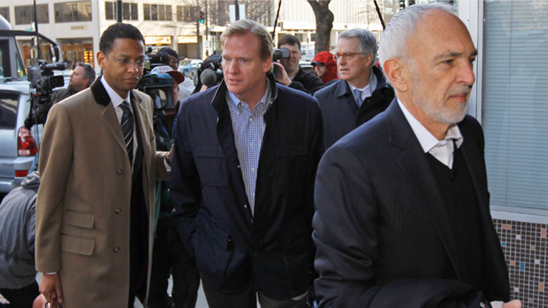 March 4: NFL outside labor counsel Bob Batterman, right, followed by Paul Hicks, Executive VP/Communications & Government Affairs, and NFL commissioner Roger Goodell arrive for football labor negotiations with the NFL players involving a federal mediator in Washington.