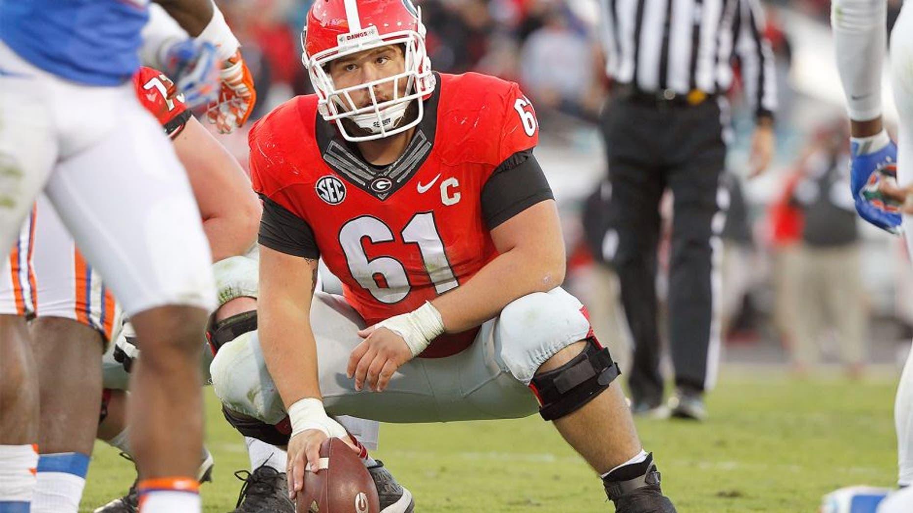 Nov 1, 2014; Jacksonville, FL, USA; Georgia Bulldogs center David Andrews (61) during the second half against the Florida Gators at EverBank Field. Florida Gators defeated the Georgia Bulldogs 38-20. Mandatory Credit: Kim Klement-USA TODAY Sports