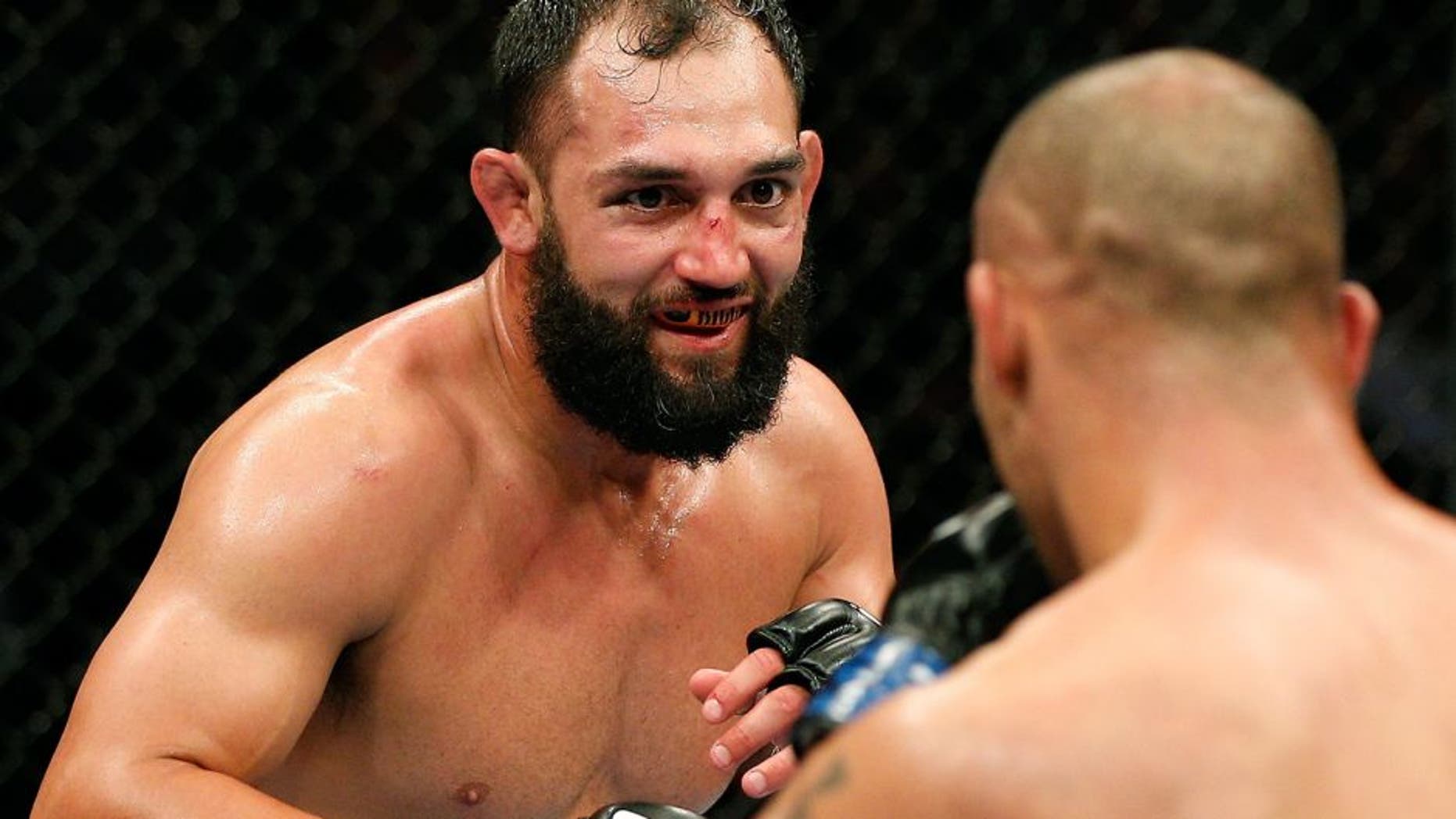 DALLAS, TX - MARCH 15: (L-R) Johny Hendricks squares off with Robbie Lawler in their UFC welterweight championship bout at UFC 171 inside American Airlines Center on March 15, 2014 in Dallas, Texas. (Photo by Josh Hedges/Zuffa LLC/Zuffa LLC via Getty Images) *** Local Caption *** Johny Hendricks; Robbie Lawler