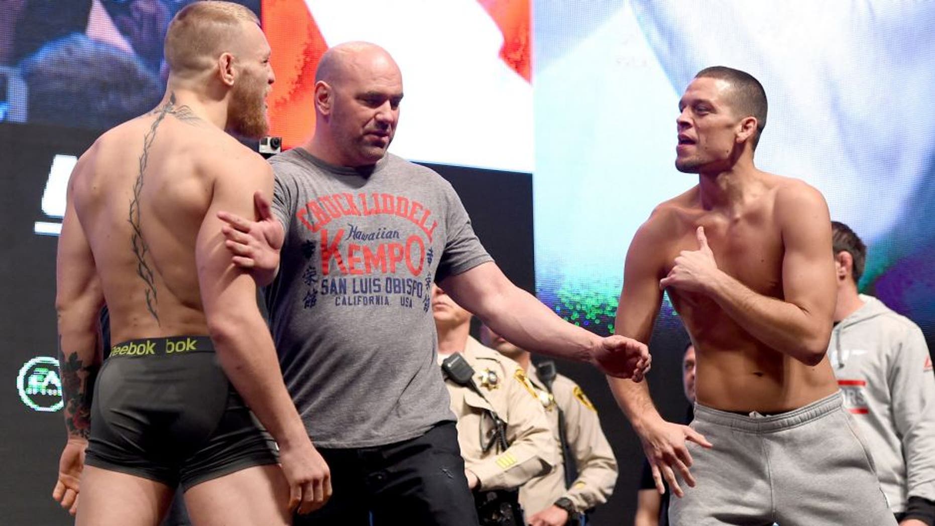 LAS VEGAS, NV - MARCH 04: (L-R) Opponents Conor McGregor of Ireland and Nate Diaz face off during the UFC 196 Weigh-in at the MGM Grand Garden Arena on March 4, 2016 in Las Vegas, Nevada. (Photo by Josh Hedges/Zuffa LLC/Zuffa LLC via Getty Images)