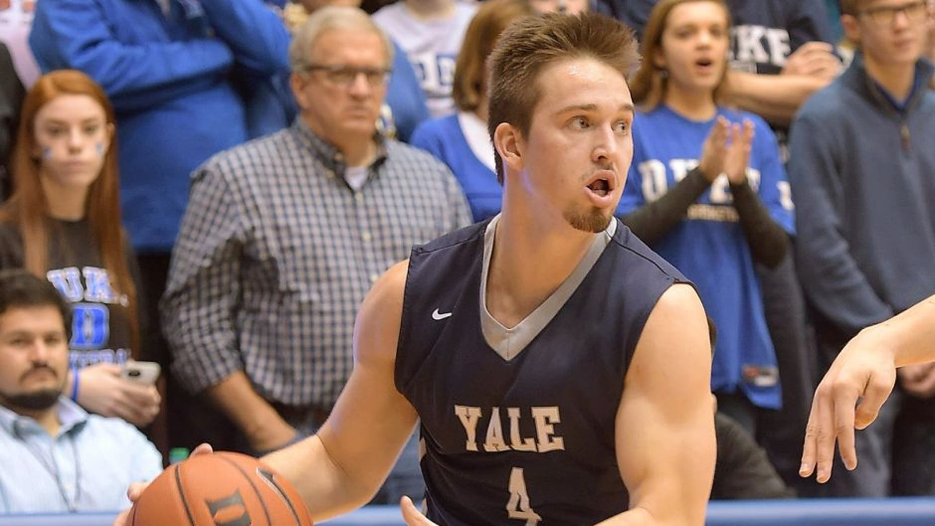 DURHAM, NC - NOVEMBER 25: Jack Montague #4 of the Yale Bulldogs moves the ball against the Duke Blue Devils at Cameron Indoor Stadium on November 25, 2015 in Durham, North Carolina. Duke defeated Yale 80-61. (Photo by Lance King/Getty Images)