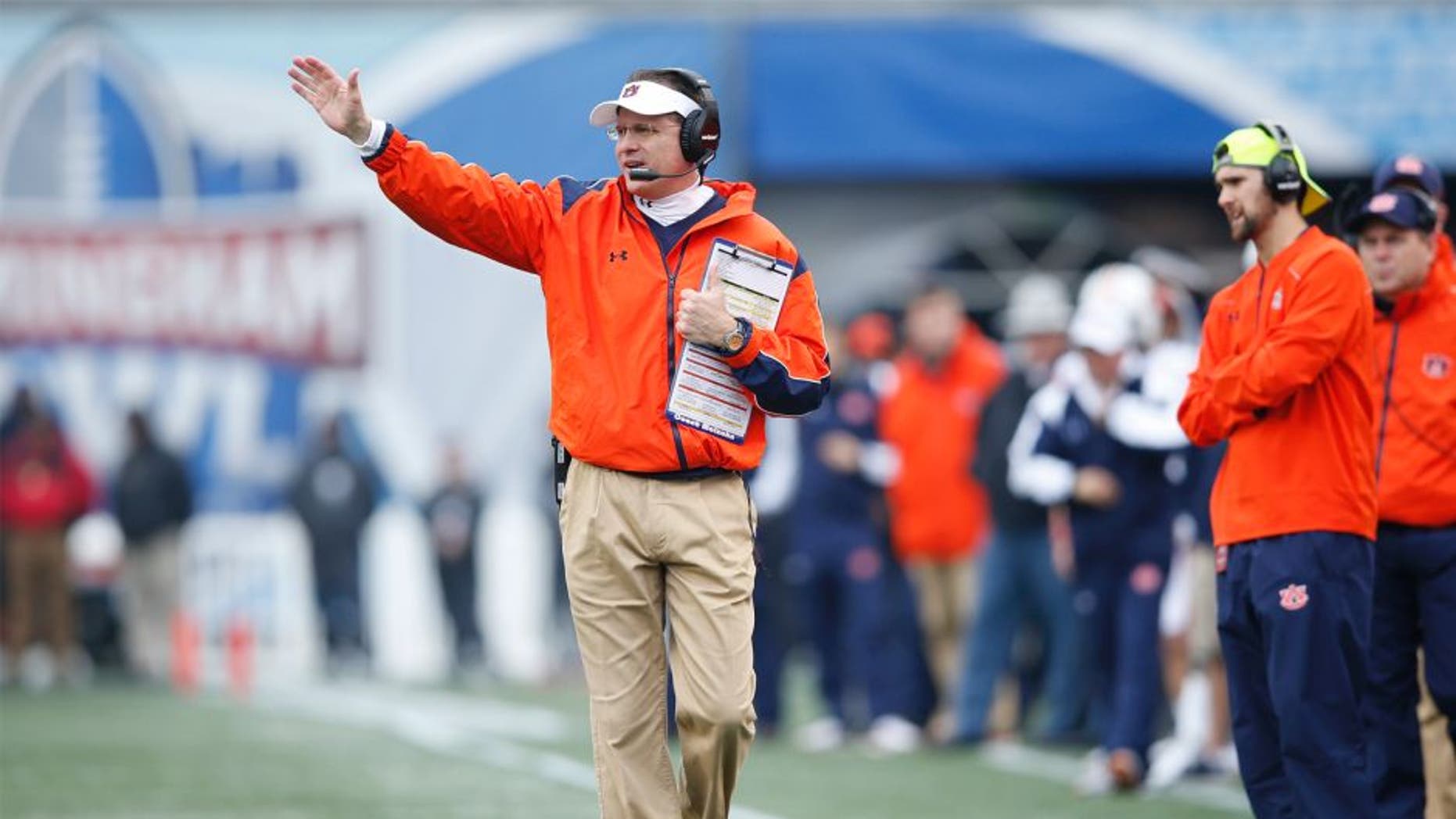 BIRMINGHAM, AL - DECEMBER 30: Head coach Gus Malzahn of the Auburn Tigers looks on against the Memphis Tigers during the Birmingham Bowl at Legion Field on December 30, 2015 in Birmingham, Alabama. Auburn defeated Memphis 31-10. (Photo by Joe Robbins/Getty Images)