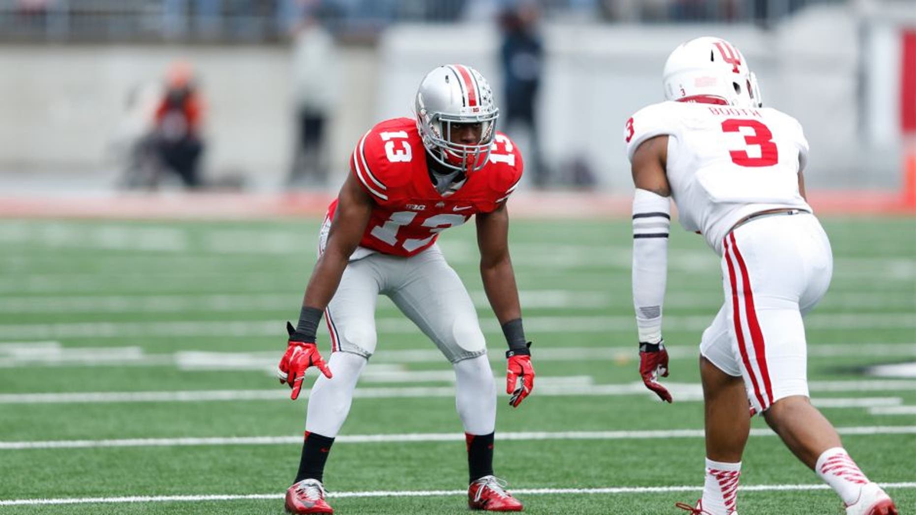 COLUMBUS, OH - NOVEMBER 22: Eli Apple #13 of the Ohio State Buckeyes in action against the Indiana Hoosiers during the game at Ohio Stadium on November 22, 2014 in Columbus, Ohio. Ohio State defeated Indiana 42-27. (Photo by Joe Robbins/Getty Images)