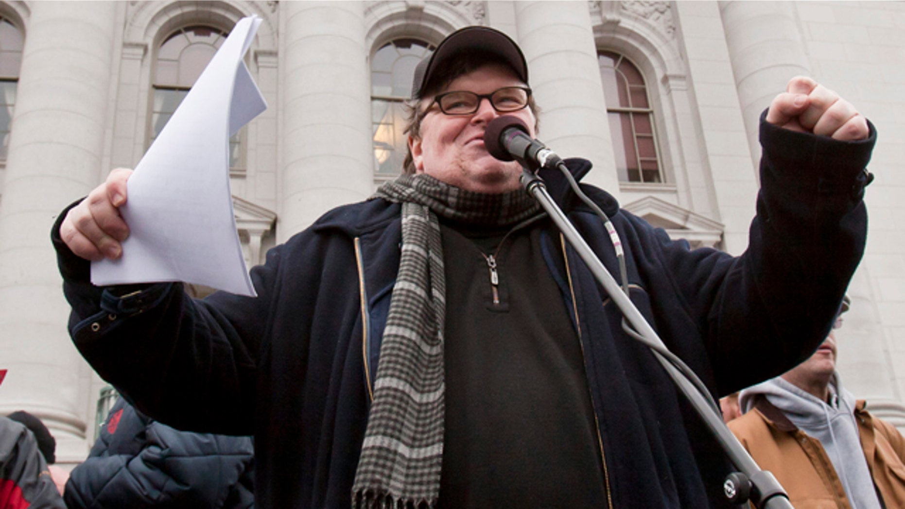 March 5: Michael Moore addresses a crowd at the state Capitol in Madison, Wis., on the 18th day of protests over the governor's proposed budget that would eliminate collective bargaining rights for many state workers.