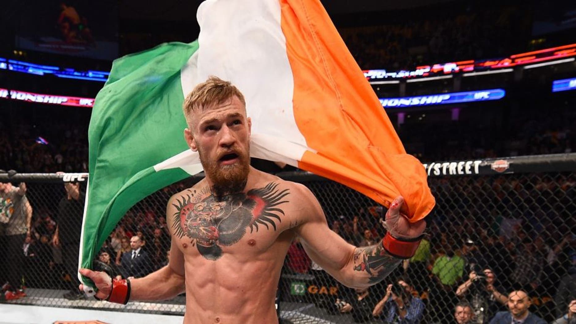BOSTON, MA - JANUARY 18: Conor McGregor of Ireland reacts after defeating Dennis Siver of Germany in their featherweight fight during the UFC Fight Night event at the TD Garden on January 18, 2015 in Boston, Massachusetts. (Photo by Jeff Bottari/Zuffa LLC/Zuffa LLC via Getty Images)