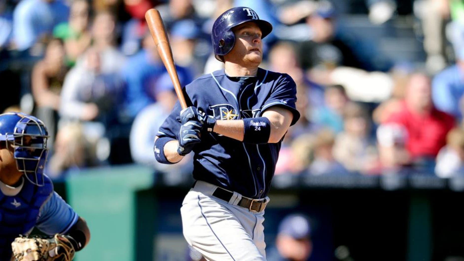 KANSAS CITY, MO - OCTOBER 3: Dan Johnson #24 of the Tampa Bay Rays bats against the Kansas City Royals at Kauffman Stadium on October 3, 2010 in Kansas City, Missouri. The Rays defeated the Royals 3-2 in 12 innings to clinch the American League East Division. (Photo by John Williamson/MLB Photos via Getty Images)