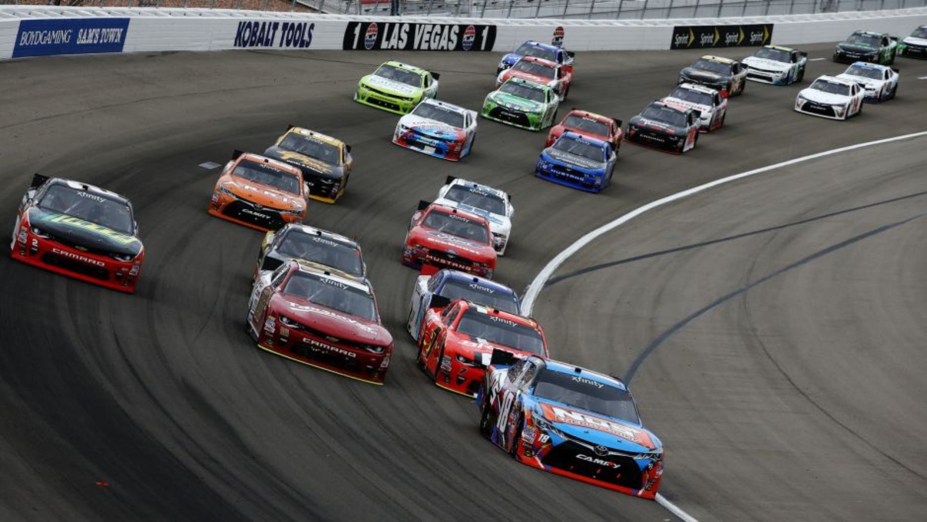 LAS VEGAS, NV - MARCH 05: Kyle Busch, driver of the #18 NOS Energy Drink Toyota, leads the field during the NASCAR Xfinity Series Boyd Gaming 300 at Las Vegas Motor Speedway on March 5, 2016 in Las Vegas, Nevada. (Photo by Sean Gardner/NASCAR via Getty Images)