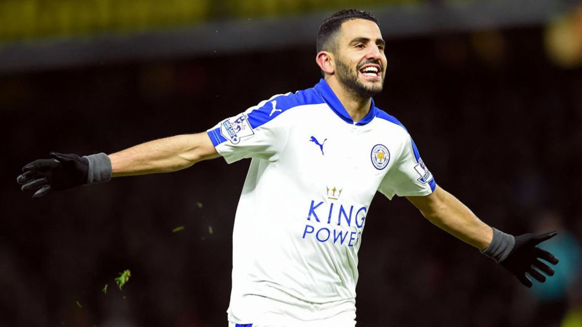 Leicester City's Algerian midfielder Riyad Mahrez celebrates scoring his team's first goal during the English Premier League football match between Watford and Leicester City at Vicarage Road Stadium in Watford, north of London on March 5, 2016. / AFP / OLLY GREENWOOD / RESTRICTED TO EDITORIAL USE. No use with unauthorized audio, video, data, fixture lists, club/league logos or 'live' services. Online in-match use limited to 75 images, no video emulation. No use in betting, games or single club/league/player publications. / (Photo credit should read OLLY GREENWOOD/AFP/Getty Images)