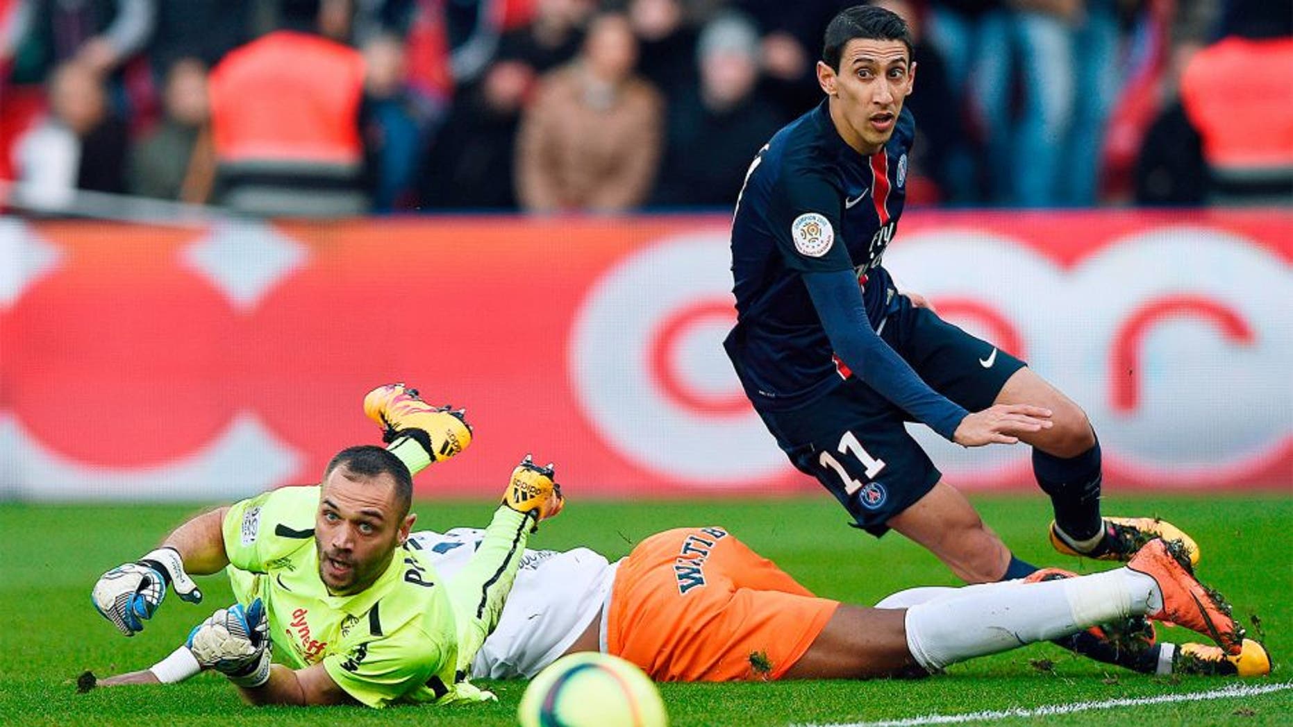 Montpellier's French goalkeeper Laurent Pionnier (L) falls next to Paris Saint-Germain's Argentinian forward Angel Di Maria (R) during the French L1 football match between Paris Saint-Germain (PSG) and Montpellier (MHSC) on March 5, 2016, at the Parc des Princes stadium in Paris. AFP PHOTO / FRANCK FIFE / AFP / FRANCK FIFE (Photo credit should read FRANCK FIFE/AFP/Getty Images)