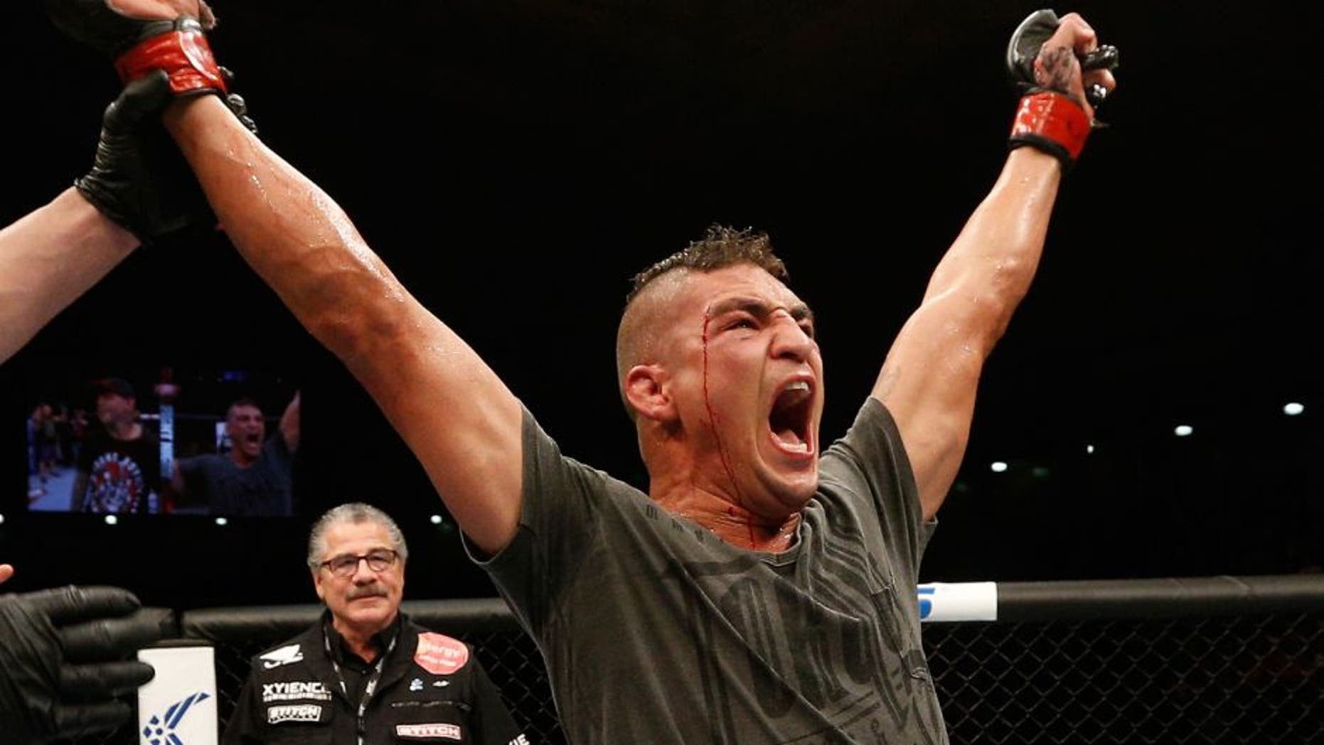 ALBUQUERQUE, NM - JUNE 07: Diego Sanchez reacts after his split decision victory over Ross Pearson in their lightweight fight during the UFC Fight Night event at Tingley Coliseum on June 7, 2014 in Albuquerque, New Mexico. (Photo by Josh Hedges/Zuffa LLC/Zuffa LLC via Getty Images)