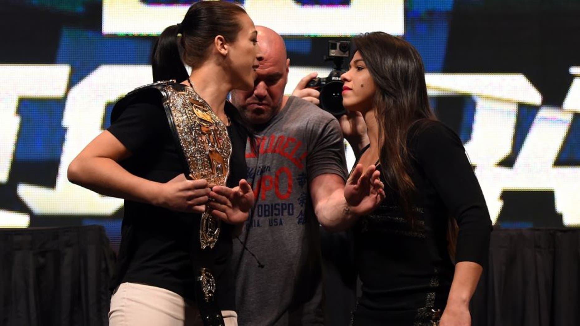 LAS VEGAS, NV - MARCH 04: (L-R) Opponents Joanna Jedrzejczyk and Claudia Gadelha face off during the UFC Unstoppable launch press conference at the MGM Grand Garden Arena on March 4, 2016 in Henderson, Nevada. (Photo by Josh Hedges/Zuffa LLC/Zuffa LLC via Getty Images)