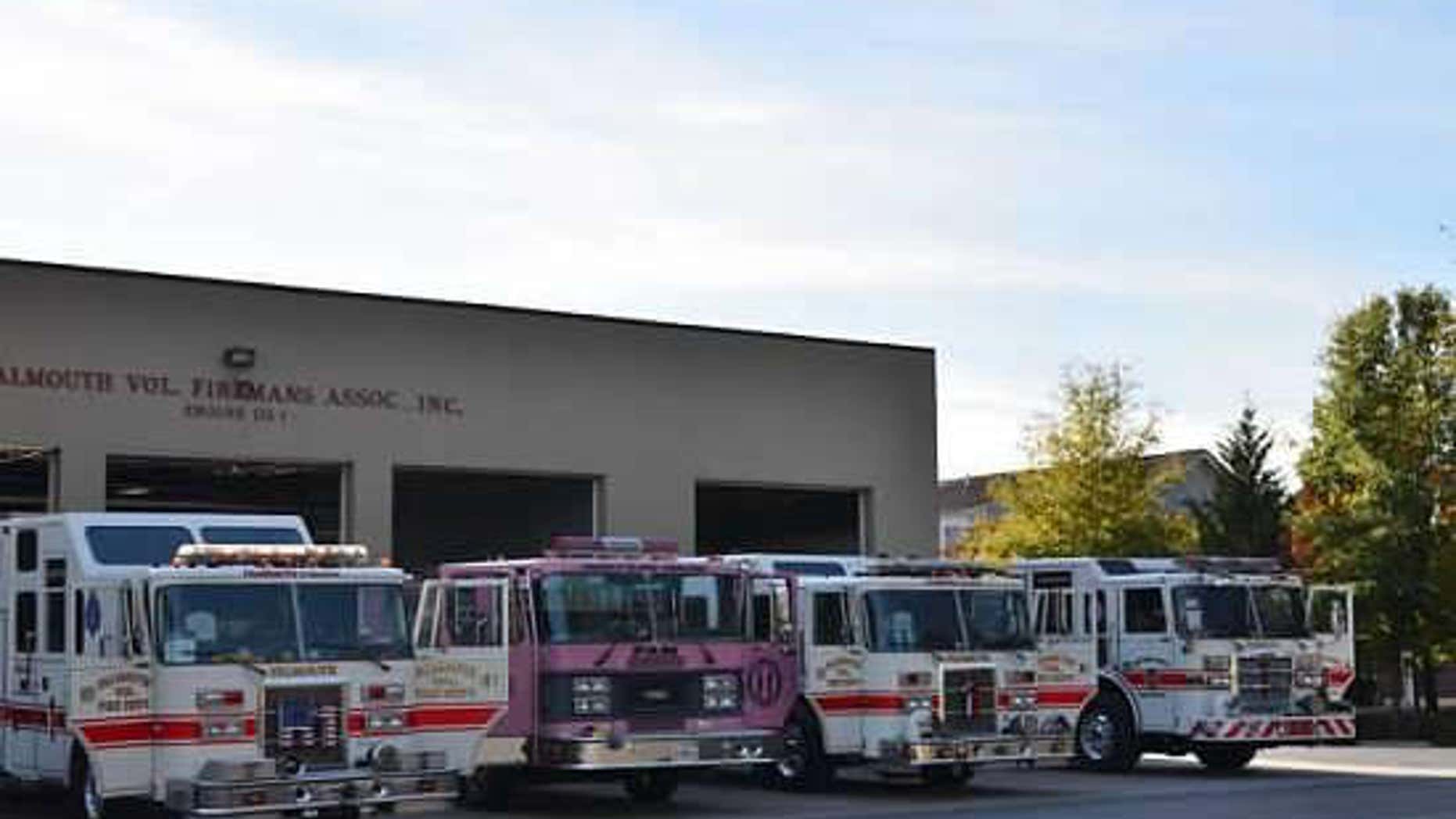 Falmouth Volunteer Fire Department fire engines on display.