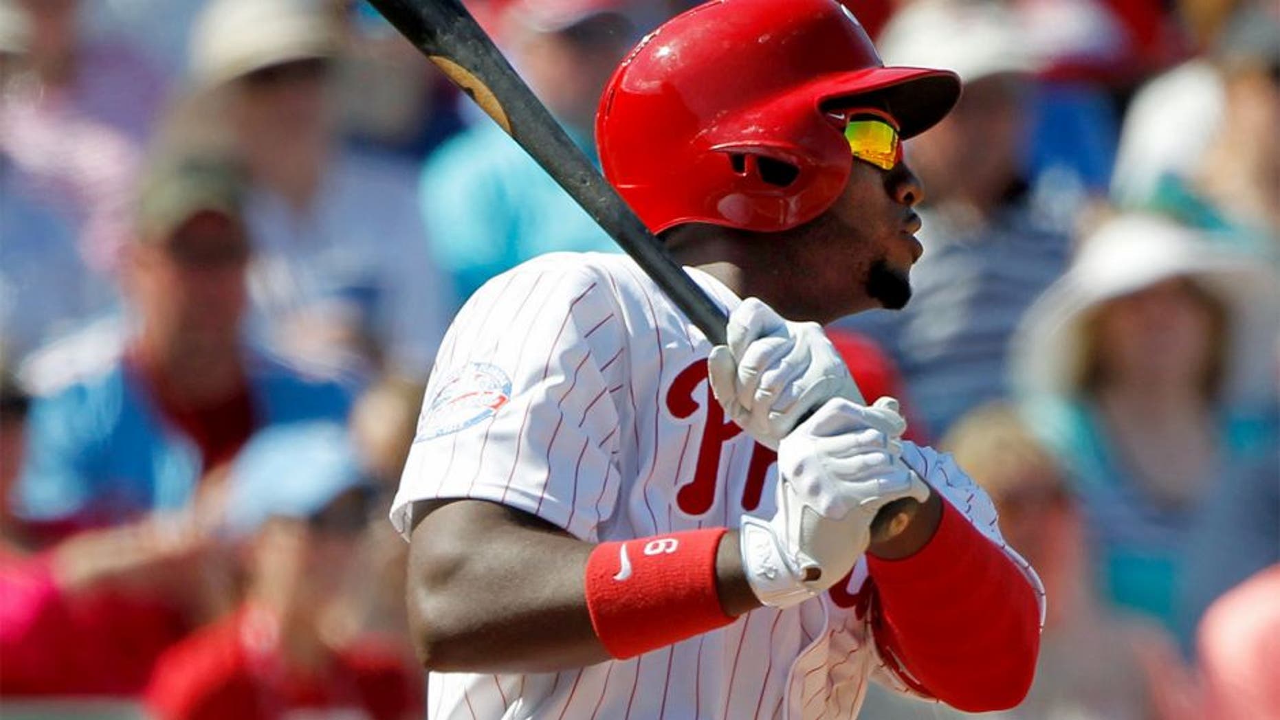Mar 3, 2015; Clearwater, FL, USA; Philadelphia Phillies left fielder Domonic Brown (9) singles during the fourth inning against the New York Yankees during a spring training baseball game at Bright House Field. Mandatory Credit: Kim Klement-USA TODAY Sports