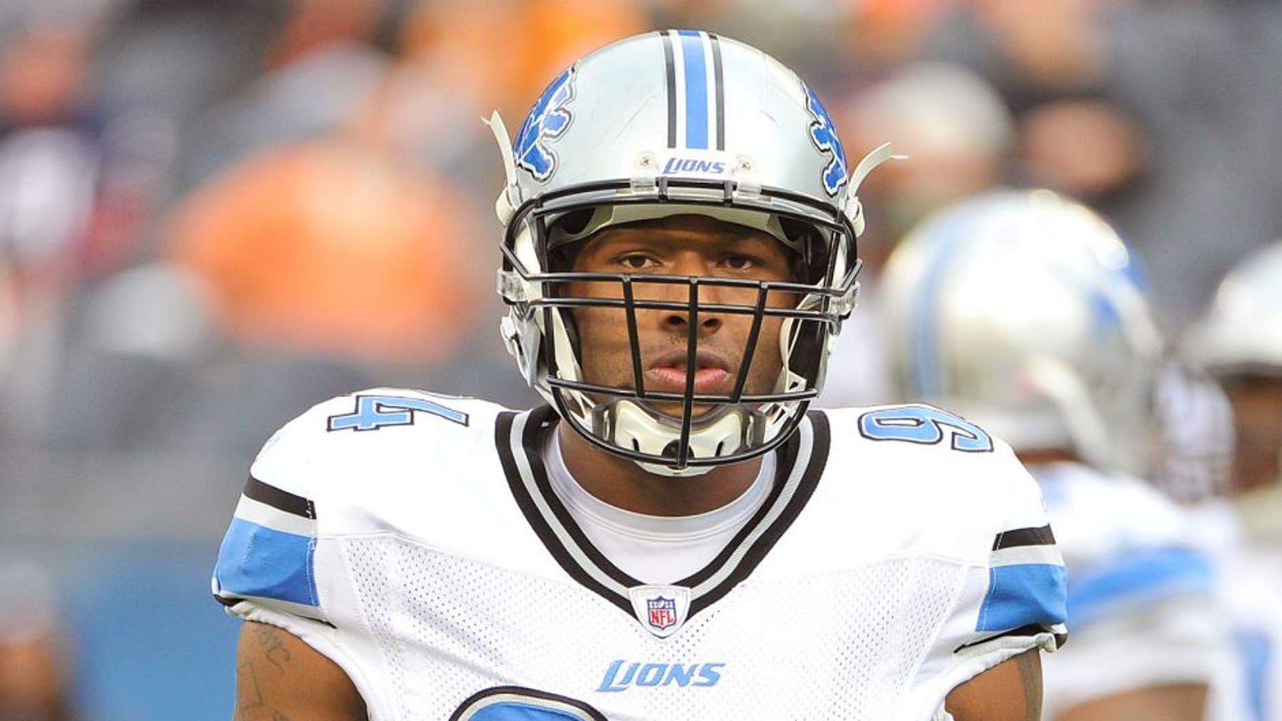 CHICAGO, IL - NOVEMBER 13: Lawrence Jackson (94) of the Detroit Lions warms up before the game against the Chicago Bears at Soldier Field on November 13, 2011 in Chicago, Illinois. The Bears defeated the Lions 37-13. (Photo by Brian D. Kersey/Getty Images)