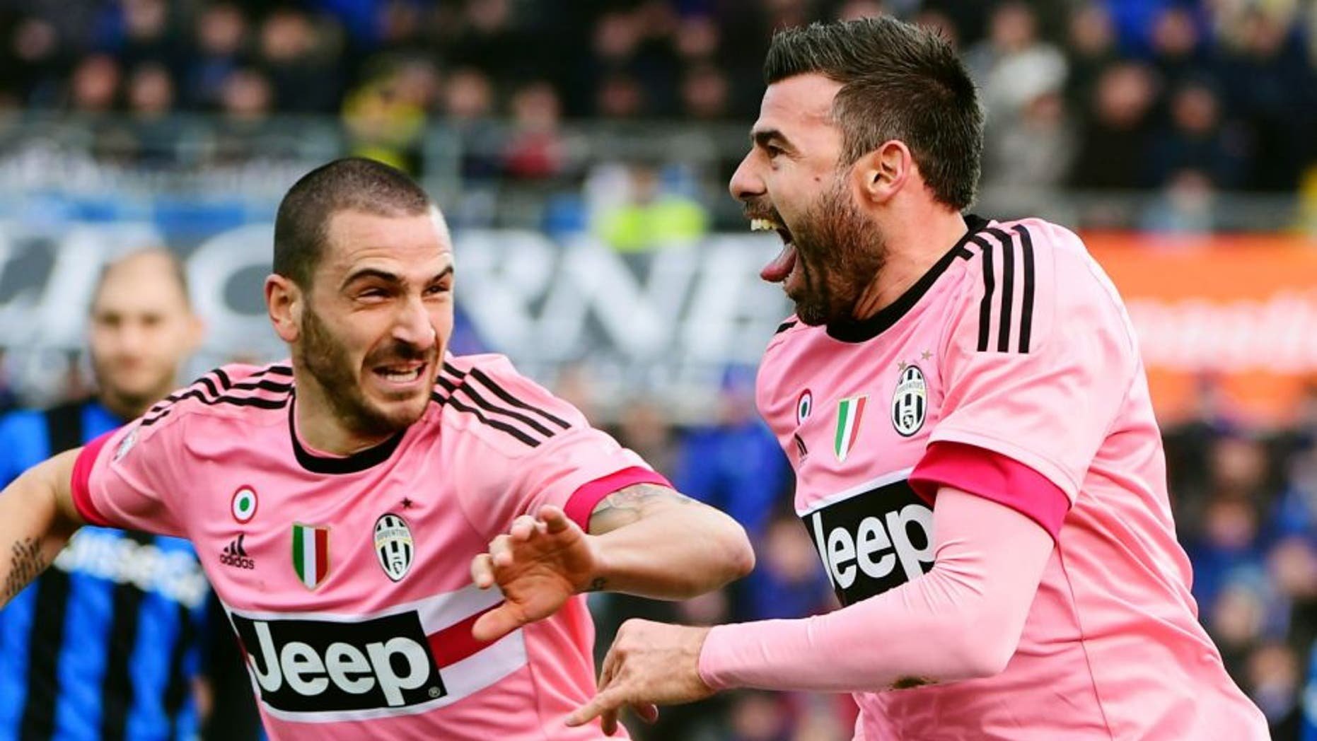 Juventus' Italian defender Andrea Barzagli (R) celebrates with Juventus' Italian defender Leonardo Bonucci after scoring a goal during the Italian Serie A football match between Atalanta and Juventus on March 6, 2016 at the Azzuri Stadium in Bergamo. / AFP / OLIVIER MORIN (Photo credit should read OLIVIER MORIN/AFP/Getty Images)