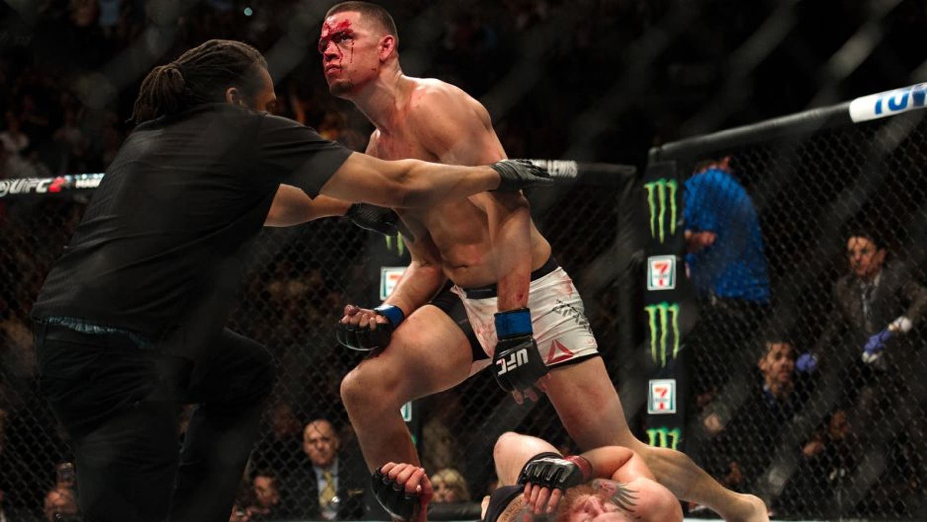 LAS VEGAS, NV - MARCH 5: Nate Diaz (top) submits Conor McGregor in their welterweight bout during the UFC 196 in the MGM Grand Garden Arena on March 5, 2016 in Las Vegas, Nevada. (Photo by Brandon Magnus/Zuffa LLC/Zuffa LLC via Getty Images)