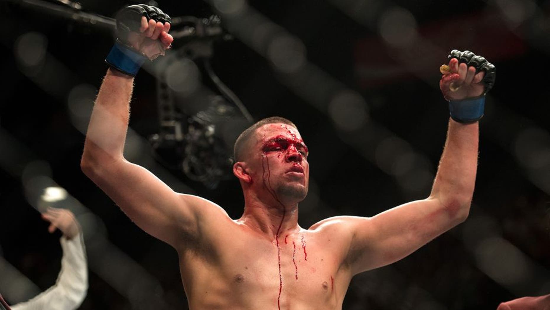 LAS VEGAS, NV - MARCH 5: Nate Diaz celebrates his submission victory over Conor McGregor in their welterweight bout during the UFC 196 in the MGM Grand Garden Arena on March 5, 2016 in Las Vegas, Nevada. (Photo by Brandon Magnus/Zuffa LLC/Zuffa LLC via Getty Images)