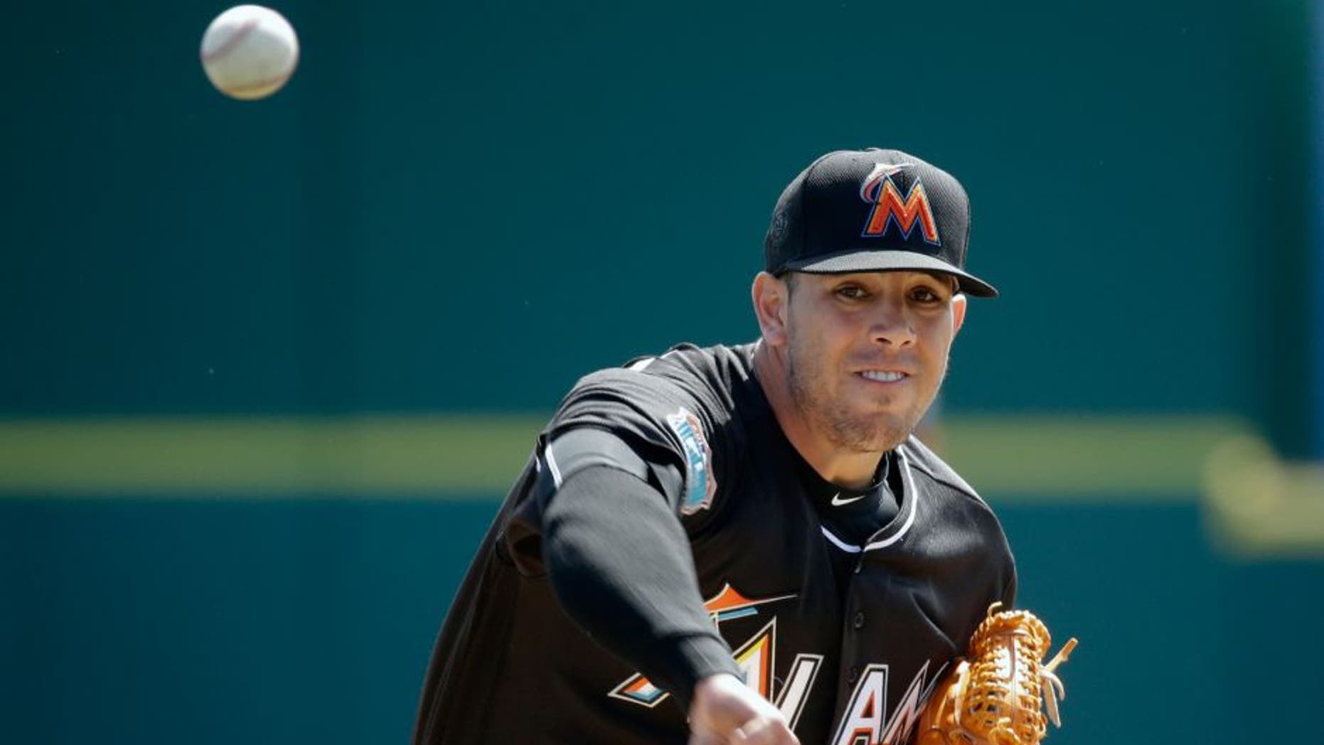 Miami Marlins starting pitcher Jose Fernandez throws in the first inning of a spring training baseball game against the Washington Nationals, Monday, March 7, 2016, in Viera, Fla. (AP Photo/John Raoux)