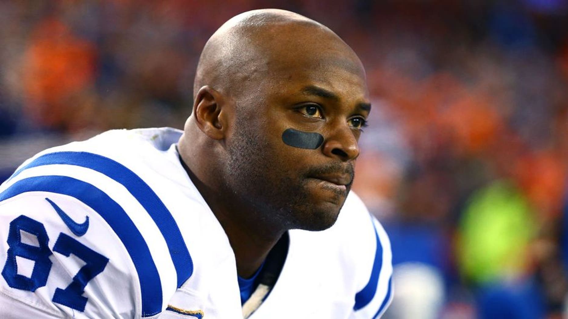Jan 11, 2015; Denver, CO, USA; Indianapolis Colts wide receiver Reggie Wayne on the sidelines in the fourth quarter against the Denver Broncos in the 2014 AFC Divisional playoff football game at Sports Authority Field at Mile High. The Colts defeated the Broncos 24-13. Mandatory Credit: Mark J. Rebilas-USA TODAY Sports
