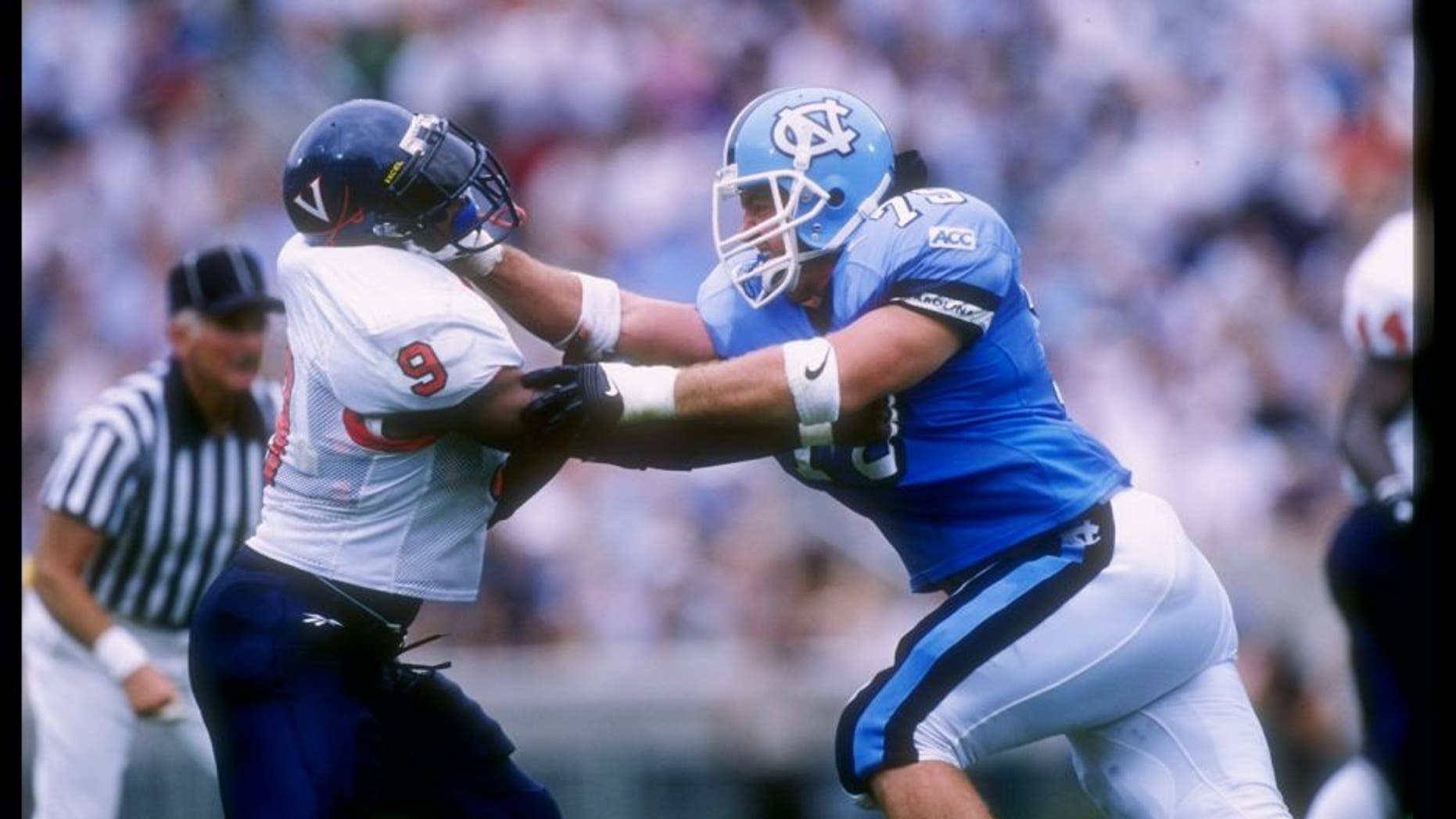 27 Sep 1997: Ryan Hoffman (right) of North Carolina battles Shannon Taylor #9 of the Virginia Cavaliers during the Tar Heels 48-20 win at Kenan Stadium in Chapel Hill, North Carolina. Mandatory Credit: Doug Pensinger /Allsport